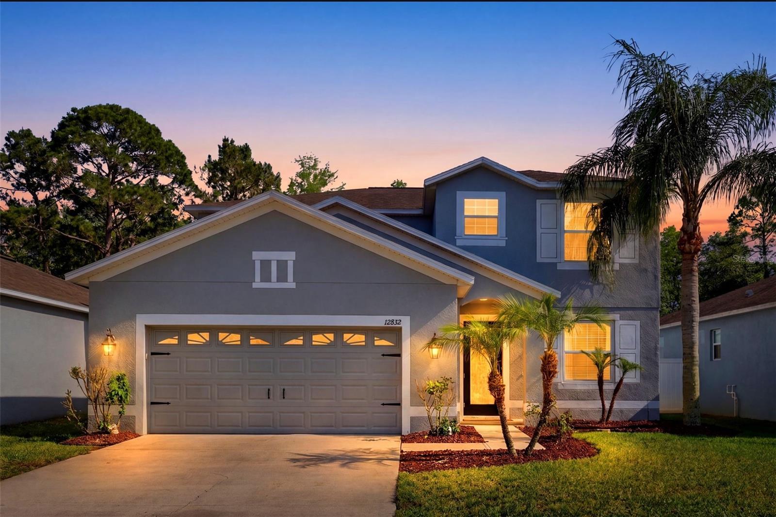 Located within a gated master-planned community just minutes from the Suncoast Expressway, this spacious 4-bedroom, 3-bathroom home offers flexible living spaces, modern finishes, and peaceful conservation views. Residents enjoy access to community amenities including a resort-style pool and playground.Inside, the thoughtfully designed floor plan features a downstairs bedroom and full bath, ideal for guests or multigenerational living, while the remaining bedrooms and oversized bonus room are located upstairs. The front flex space offers endless possibilities and can easily function as a formal dining room, home office, fitness space, or additional living area.The kitchen is designed for both everyday living and entertaining, showcasing a large center island, gleaming granite countertops, 42” wood cabinetry, upgraded tile flooring, and an undermount deep stainless steel sink with gooseneck faucet. The open layout flows seamlessly to the screened lanai overlooking the fenced backyard and tranquil conservation setting.The oversized primary suite features double vanities with granite counters, a relaxing garden tub, spacious walk-in shower, and generous closet space. Additional highlights include abundant storage throughout, fresh interior and exterior paint in a modern neutral palette, a reverse osmosis filtration system, and a dedicated 240V/40-amp circuit ready for an EV charger.Offering space, versatility, and a desirable location, this home is move-in ready and designed to fit a variety of lifestyles.