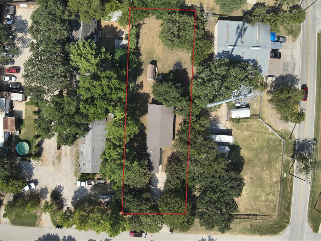 Nestled on a generous 0.45-acre lot in Southlake, this well-maintained property presents an exceptional opportunity: you can either move straight in and enjoy comfortable living now, or leverage the spacious, tree-lined lot to build your dream home in one of the area's most sought-after areas of Dallas-Fort Worth. With residential and commercial zoning flexibility, the property offers the various opportunities, making it a rare and versatile find for both homeowners and savvy business owners! The surrounding area is rich in amenities, as well as in close proximity to Southlake Town Square, parks, and top-tier schools!