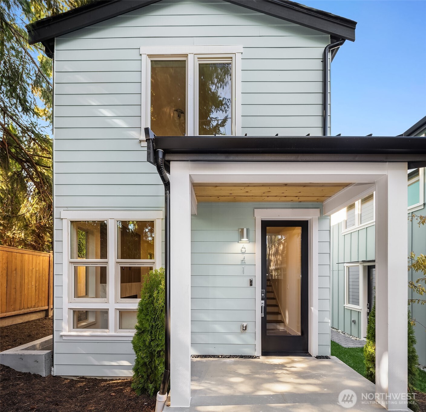 Welcome to this new construction, stand-alone home in Kirkland's West of Market neighborhood. Main floor features cozy fireplace and open concept living and dining area. Large kitchen peninsula adds functional counter space additional storage, and convenient seating. Private yard space is perfect for BBQs or pets. Two entrances, ample storage and powder bath all add to the highly functional design. Upstairs, both bedrooms feature an ensuite bath, making this home both practical and exceptionally comfortable. Enjoy proximity to Lake Washington, Waverly Beach Park, and downtown Kirkland. Included off-street parking adds to convenience of this amazing home.