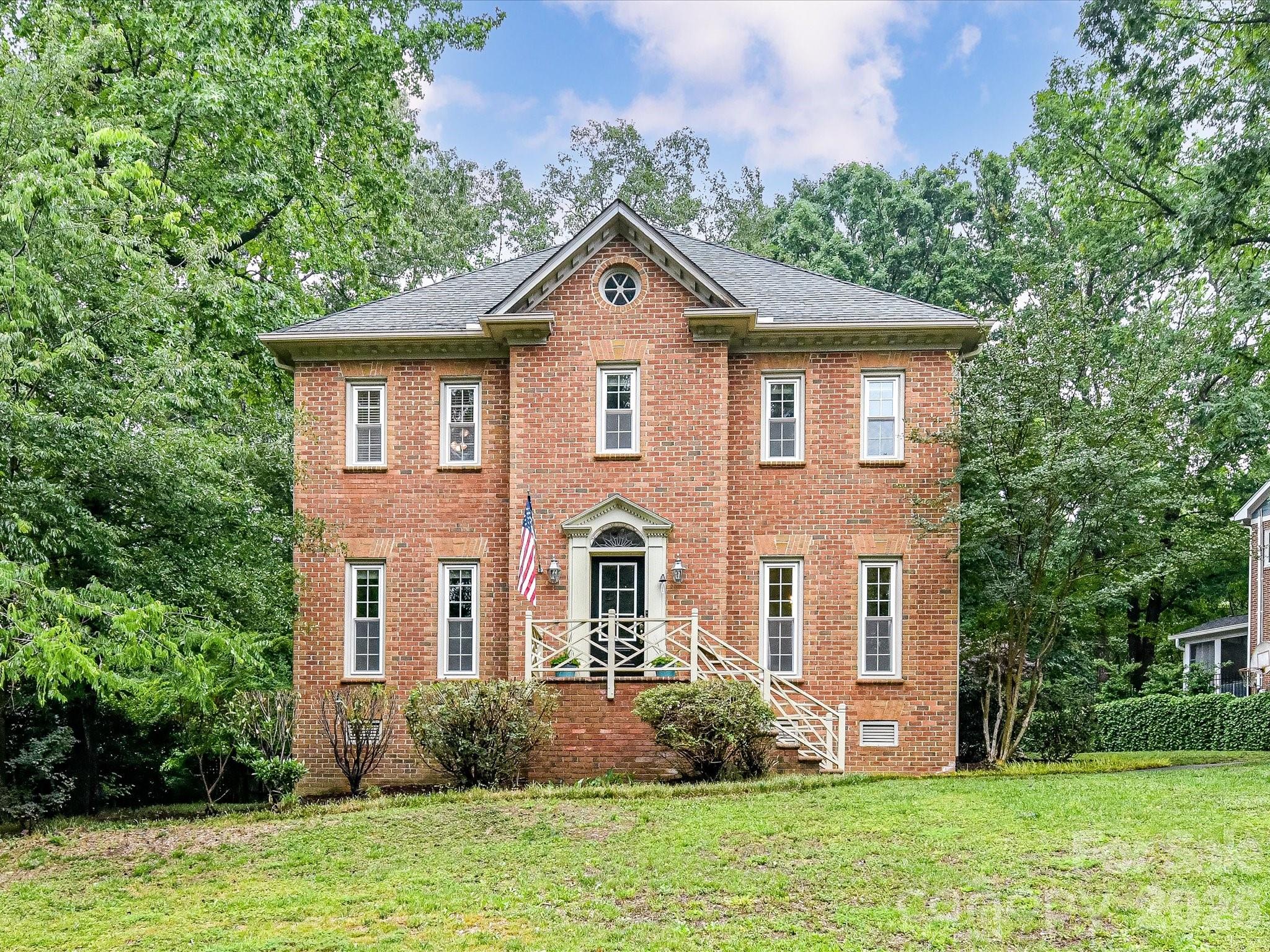 Stately and timeless, this full-brick home in Park Crossing pairs classic charm with modern upgrades. The first floor boasts nine-foot ceilings and is designed for effortless entertaining featuring a formal dining room, a breakfast nook, and a well-appointed kitchen with stainless steel appliances, honey bronze hardware, and glass-paned cabinets, alongside a coveted secondary "bantry" area that perfectly supplements the primary pantry. Directly off the family room, a large screened-in porch offers a tranquil escape that opens to a spacious adjoining deck. Overlooking a fenced yard with mature trees and hardscaping, this outdoor space is a blank canvas ready for a low-maintenance, shaded oasis built for effortless Carolina living. The second floor features a completely carpet-free layout with the primary suite, three additional bedrooms, and a hall bath. The primary suite is a true sanctuary featuring two walk-in closets and a beautifully updated primary bath with a walk-in shower and dedicated water closet. Separated from the main bedrooms, the bonus room serves as a true flex space. Perfect as a quiet guest or media wing, it features its own brand-new dedicated HVAC unit (2026) along with an attached storage room or private office, making the space ideal for out-of-town visitors, a play space with ample storage, or other specialized use. Other updates and features include a spacious family room with a fireplace, a versatile front office/flex space featuring a handsome accent wall, updated windows, new front door (2026), and a privacy fence. Roof is older and has weathering consistent with its age; the home is priced to reflect that. No known functional issues.All of this sits in Park Crossing, one of South Charlotte’s most sought-after neighborhoods. Residents enjoy direct access to the Little Sugar Creek Greenway, an active social calendar, and a Swim & Racquet Club featuring a junior Olympic pool, kiddie pool, tennis and pickleball courts, and a playground. Memberships to the Swim and Racquet Club and Social Club are additional.