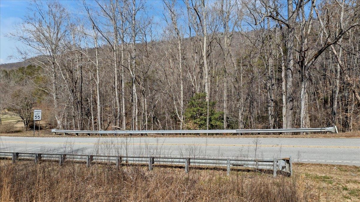 Beautiful 3.24-acre homesite located along scenic Highway 11 in the desirable Glassy Mountain Township area of Landrum. This gently sloping property features mature trees and multiple potential building sites, offering the perfect setting for a private mountain retreat or custom home. Conveniently located just minutes from North Greenville University and directly across from the Glassy Mountain Fire Department, providing both accessibility and peace of mind.  No known restrictions, giving you flexibility to build to suit your needs. The property is served by Greenville County Schools: Tigerville Elementary, Blue Ridge Middle, and Blue Ridge High School.  An existing easement provides access to an adjacent parcel. Please use care when viewing the property and avoid driving onto neighboring land.  Enjoy the beauty of the Upstate with convenient access to nearby towns, outdoor recreation, and the scenic charm of the Highway 11 corridor. A rare opportunity to own acreage in a sought-after area of northern Greenville County.