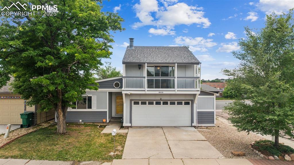 This thoughtfully laid-out 3-bedroom, 2-bath home sits on a sunny corner lot near Quail Lake, Cheyenne Mountain, and Fort Carson. Inside, you’ll find laminate floors, two fireplaces, and a main-level living room that flows into a functional kitchen with all major appliances included. The primary bedroom offers generous closet space, an attached bath, and a skylit dressing area. Upstairs, the loft opens to a private balcony—great for plants, reading, or unwinding. The lower living room leads out to a fenced yard and deck, offering space to relax or entertain. A newer A/C unit, forced air heating, laundry closet with washer and dryer, and attached 1-car garage round out the home’s conveniences. Conveniently located near shopping, dining, parks, and trails, this home offers both comfort and accessibility in one inviting package.