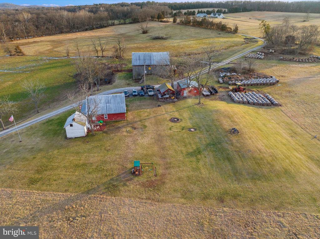 Overlooking Cunningham Valley-South Central PA Farm spectacular 100+ acres located just south of Historic Gettysburg PA.  Historic 1860's private residence and bank barn. Estimated 1427 ft.  of stream frontage, nestled on private lane. Potential for three separate parcels. Land is not restricted by any Conservation Agreements.  ATTENTION: Farm is not in preservation and can be subdivided into three parcels.