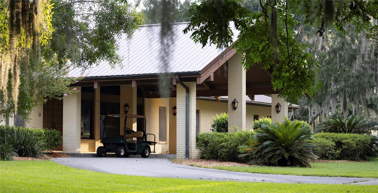 Situated in the heart of Ocala, Florida - the "Horse Capital of the World" - the Kingwood Foxden property boasts a rich history and stunning natural beauty. Originally part of the renowned Hooper Farm, the Hooper estate was home to a Kentucky Derby winner and has been meticulously maintained over the decades. This versatile  farm will lend itself beautifully to any equestrian discipline and currently operates as a top breeding and training facility for Warmblood horses.   Spanning 157.74 acres, this farm is located less than 4 minutes from the World Equestrian Center. As you approach the property, you're greeted by a grand gated entrance flanked by stone columns and ornamental landscaping. A driveway, lined with majestic oak trees, leads you to the impressive collection of equestrian amenities .The main residence is a one-story, 4,923 square foot home that has been renovated over the years, boasting high-end finishes and modern amenities. In addition to the main house is a 1,572 square foot manager's residence and a charming 960 square foot cottage/farm office, all of which are in excellent condition. The property's equestrian infrastructure is truly remarkable, featuring a 24-stall training barn with apartment and two large tack rooms, an 11-stall stallion barn, and a 24-stall shed-row barn with apartment and office, totaling over 27,000 square feet of barn space. Additionally, the farm includes a state-of-the-art 80' x 240' covered arena with kick walls and mirrors constructed in 2022, as well as a 100' x 200' outdoor arena built in 2021.Beyond the impressive facilities, the Kingwood Foxden property offers extensive site improvements, including over 40,000 linear feet of 3- and 4-board fencing, 30 paddocks, and 3 large pastures. An old racetrack on the property provides a dedicated space for exercising and training horses. With its extensive highway frontage, the Kingwood Foxden property also offers a rare opportunity for flexible ownership. The layout lends itself naturally to the creation and sale of a 50-to 72-acre out-parcel, allowing for subdivision without affecting the main residence or the extensive equestrian improvements.  Want to build your own dream on this 50-to 72-acres with no improvements?  Owner will divide tract.  Property lends itself to separate up to 70 acres with no improvements with over 1000 feet of frontage on state highway 40.  With its prime location on State Highway 40, the same highway that leads to the World Equestrian Center, and its well-maintained internal paved roads, the Kingwood Foxden property offers unparalleled convenience and accessibility. This exceptional equestrian estate, steeped in history and surrounded by natural beauty, is a true gem in the heart of Ocala's thriving horse community.In the event your client has 1031 exchange money the property in lies in the federally designated Opportunity Zone.
