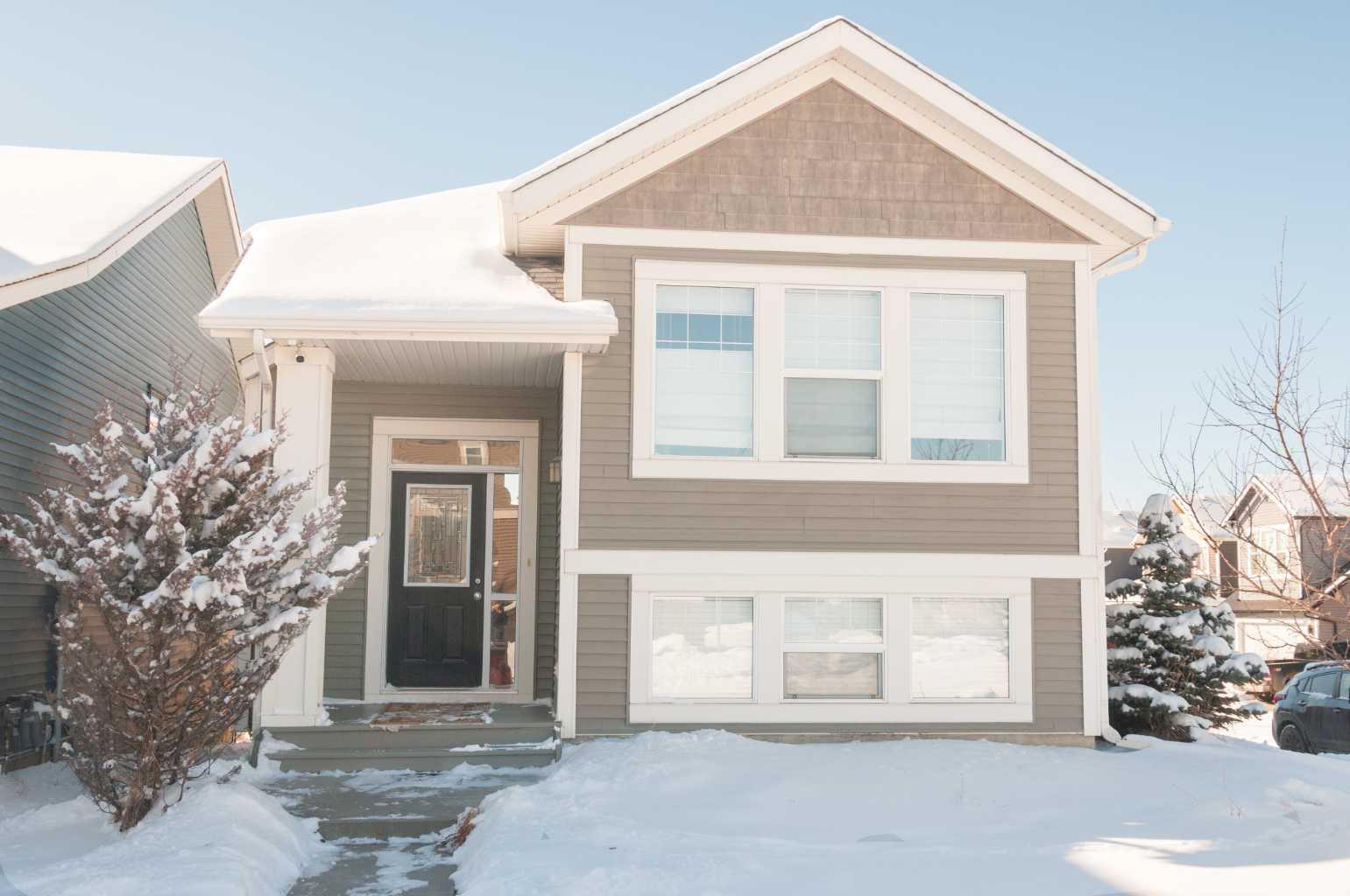 Welcome home to this charming 4-bedroom bilevel home in family friendly Fireside. The home is conveniently located just steps away from two schools (K-8 public and a K-6 Catholic) as well as being close to restaurants and professional offices. You will enjoy the wonderful light that this home offers with its large windows both upstairs and downstairs. You will also appreciate the large corner lot and bilevel layout which maximizes your livable space. Upstairs there is a large open concept dining area, kitchen, and living area. The kitchen features an eat in island with sink and new dishwasher. Your cozy living room features a gas fireplace - perfect for those frosty winter nights! Just off the kitchen, there is a deck which features mountain views. The upstairs primary bedroom is spacious and includes a large walk-in closet. There is also a second bedroom/den upstairs. Downstairs there is a large family/rec room, fully finished laundry room, and two larger bedrooms. In the backyard you can watch the kids play from your patio on warm summer days. There is also a detached garage that has two parking spaces and room to park your full-size truck or SUV. This home is a must see! Call your Realtor® or the listing agent to arrange your private showing today.