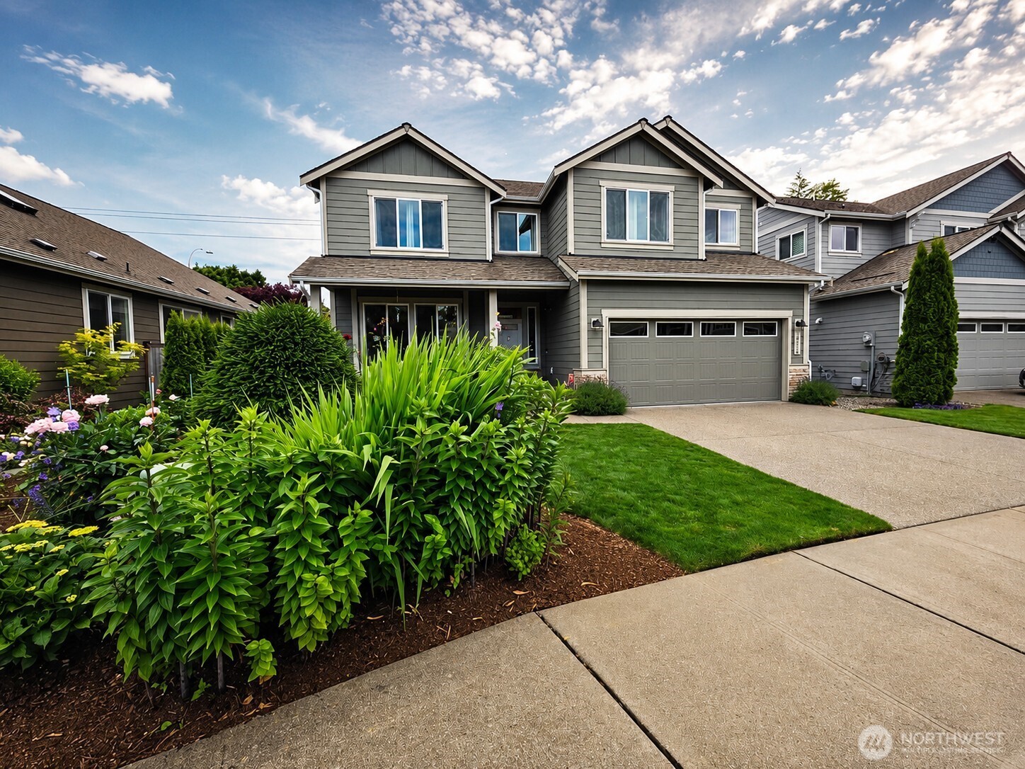 Stunning 4BD/2.5BA 2020 home in Black Lake Palisades! Nestled in a desirable, walkable neighborhood, minutes from I-5 with local conveniences, this beautifully maintained home offers the perfect blend of comfort, modern style, & thoughtful design. ** Inside, high ceilings, natural light, & wood floors welcome you into an expansive floor plan designed for everyday living & entertaining. Host memorable dinners in the formal dining room, enjoy the convenience of a butler's pantry w/wine fridge, cook w/ease in the expansive chef's kitchen featuring espresso-stained beechwood cabinetry, quartz countertops, stainless steel appliances, double ovens, a gas cooktop, eating bar, & additional dining area. ** Stunning gardens create a colorful backdrop w/hydrangeas, roses, peonies, lavender, dahlias, lilies, & more, while the backyard offers fresh blueberries, raspberries, & strawberries. The inviting living room is anchored by a cozy gas fireplace & oversized windows overlooking the backyard, creating the perfect place to relax year-round. ** Upstairs, retreat to the expansive primary suite featuring a spa-inspired 5-piece bath w/soaking tub, separate shower, dual vanities, private toilet rm, & walk-in closet. Three additional bedrooms provide flexibility for guests, hobbies, a home office, or multi-generational living. ** Meticulously cared for & truly move-in ready, this exceptional home offers the lifestyle you've been waiting for in one of Olympia's most sought-after communities.