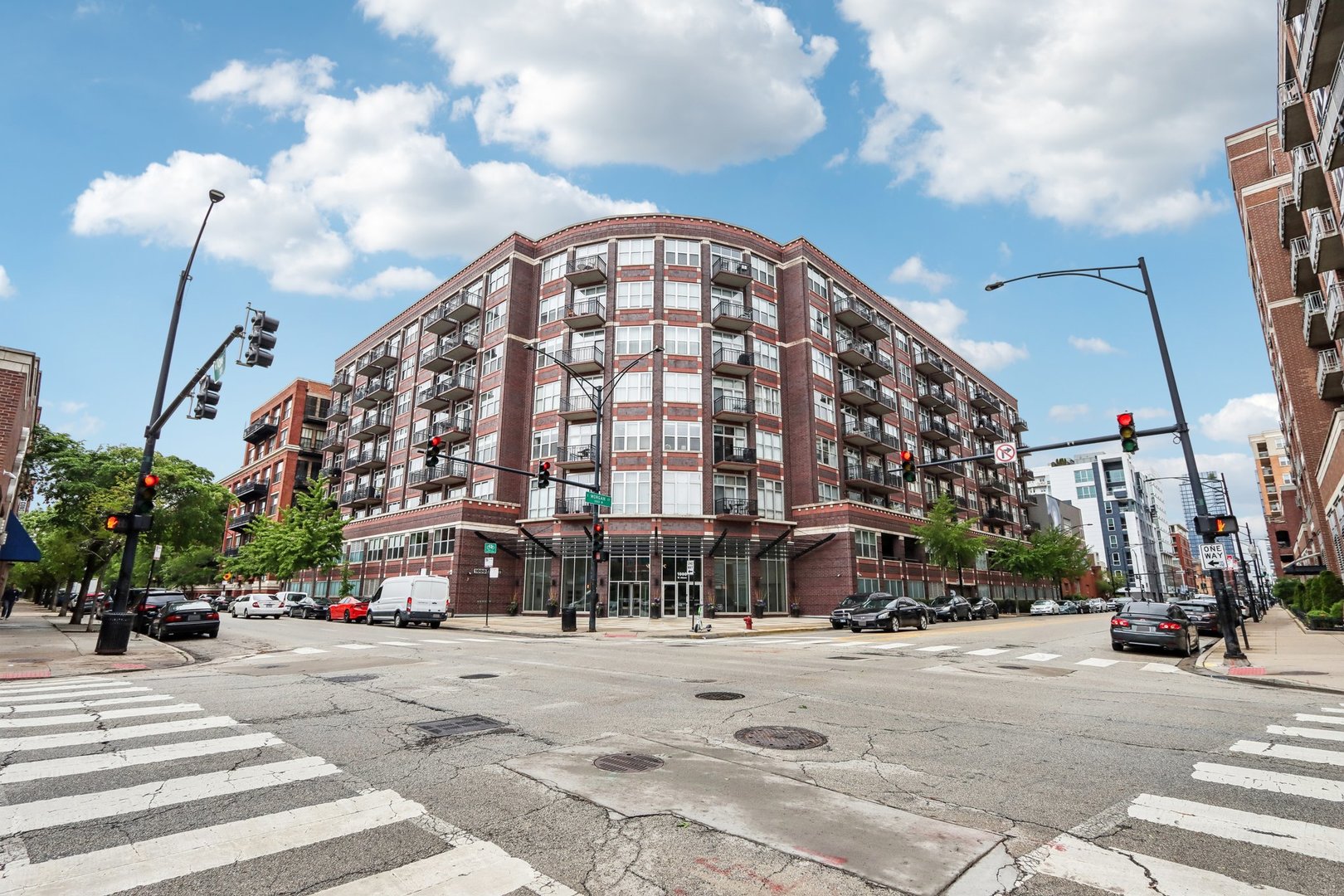 Discover urban living at its finest in this beautifully appointed West Loop loft, located in one of Chicago's most desirable neighborhoods. Just minutes from three major highways, award-winning restaurants, and the nearby Mary Bartleme Park, this home combines the best of city convenience with a welcoming neighborhood feel. The unit features a 2021 full kitchen remodel with sleek leather-finished granite countertops, stainless steel appliances, a spacious peninsula perfect for entertaining, and a full-size pantry cabinet. Private balcony perfect for summer entertaining. Cozy fireplace for added comfort in the Chicago winters. In-unit washer/dryer. Additional oversized storage unit. This well-maintained building offers premium amenities, including a fully equipped gym, on-site dry cleaners, 24/7 security, a business center with printer access, a courtyard and a shared roof deck with amazing city views. Secure indoor parking space is available for an additional $25K. Easy access to public transportation (CTA Pink, Blue, and Green lines).