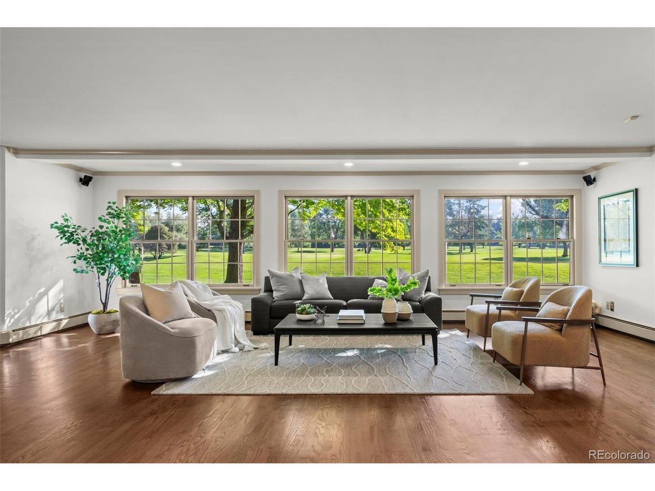 Perfectly situated at the end of a quiet cul-de-sac, this home is surrounded on 3 sides by mature landscaping, with the 4th/back side overlooking Boulder Country Club's Par 3 Golf Course, creating its own private oasis. On a .44-acre lot, this home offers over 5,500 SQFT of thoughtfully laid-out living space, which has been remodeled for everyday comfort and a truly one-of-a-kind first floor entertainment space. Upstairs, you'll find four spacious bedrooms, including a luxurious primary suite complete with its own private sitting room - the perfect spot for morning coffee. Rich hardwood floors flow throughout the main level, complemented by fresh paint and new carpet. The kitchen features rich granite countertops, a large island, breakfast bar and custom built-in appliances, while the great room bar makes for an exceptional gathering space. Enjoy the hearth room's morning sun, or venture into the study to discover secret stairs behind a wood panel. A hidden wine cellar and tasting room awaits you below. The arched, cave-like structure offers a fun environment for entertaining and collecting. Step outside to an expansive covered patio with sweeping golf course views. This relaxing space offers a built-in grill, tranquil water feature, and fireplace. A two-car garage with extra room for two golf carts, and a separate, attached single-car garage provide ample space for a workshop, or extra storage. The finished basement adds a spacious fifth bedroom and bath with additional flexible living space. Walking distance to Boulder Country Club, and moments from Niwot Market and Gunbarrel's favorite local shops, restaurants, and breweries - this is one you simply must experience in person.
