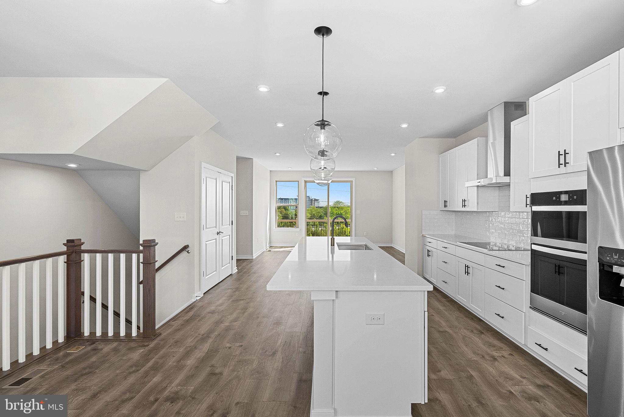 NEW CONSTRUCTION. Special all-in price, ready for immediate move in! EnjoySpecial Pricing and $15K In Closing Costs (must select choice lender) until 5/31.Introducing the Harding, a stunning 3-level luxury townhome with a 2-car garage in thesought-after Belmont Park community in Ashburn, VA. This end unit spacioustownhome offers 4 bedrooms and 3.5 baths, designed for comfort and style with 9 ft.ceilings throughout. The gourmet kitchen is a showstopper, featuring maple shaker-stylecabinets with hardware, pendant lighting, quartz countertops, tile backsplash, a largepantry, range hood, microwave/wall oven, and stainless-steel Whirlpool appliances.Designer laminate flooring flows through the foyer, kitchen, dining room, great room,and office for a sleek, cohesive look. Upstairs, the luxurious primary suite includes agenerous walk-in closet and a spa-inspired bathroom with raised double vanities, quartzcountertops, and a ceramic tile shower with seat. A deck is off the main level to extendgatherings and relaxation. Plus, the EV charger-compatible outlet in your garage makesthis home future-ready. Enjoy low-maintenance living with snow removal, lawn care, andexterior upkeep all handled for you—giving you more time to enjoy life. Belmont Parkoffers resort-style amenities including bocce ball, volleyball, playgrounds, andcommunity greenspace. Located in Ashburn, you’ll have quick access to majorroadways, Dulles Airport, and endless dining and entertainment options like Cooper’sHawk Winery and TopGolf. Beazer Homes at Belmont Park are designed to live betterday to day, with energy efficient construction that lowers monthly utility costs, thoughtfuldesign options that make personalization simple, and Mortgage Choice, where our toplenders help you compare options and save money on your home loan. This highperformance home is built to lower your total cost of homeownership through reducedutility bills, durable materials, and high quality construction that minimizes long termmaintenance costs. Beazer Homes is proud to be America’s #1 Energy Efficienthomebuilder. Our FY25 average gross HERS score of 32 (38 excluding solar) was thelowest of the publicly reported scores among the top 30 U.S. homebuilders by volumeidentified by Builder Magazine’s Top 100 List (based on 2025 total closings). Getprotection against rising energy costs without changing how you live. Every Beazerhome is pre-wired for solar, making it easier and more affordable to add a renewablesystem when you are ready. Photos of actual home. Model Home Hours: Mon–Sun, 11AM–6 PM. Use 19774 Sepia Square Ashburn, VA 20147 for GPS directions. Please goto the information center listed here first.