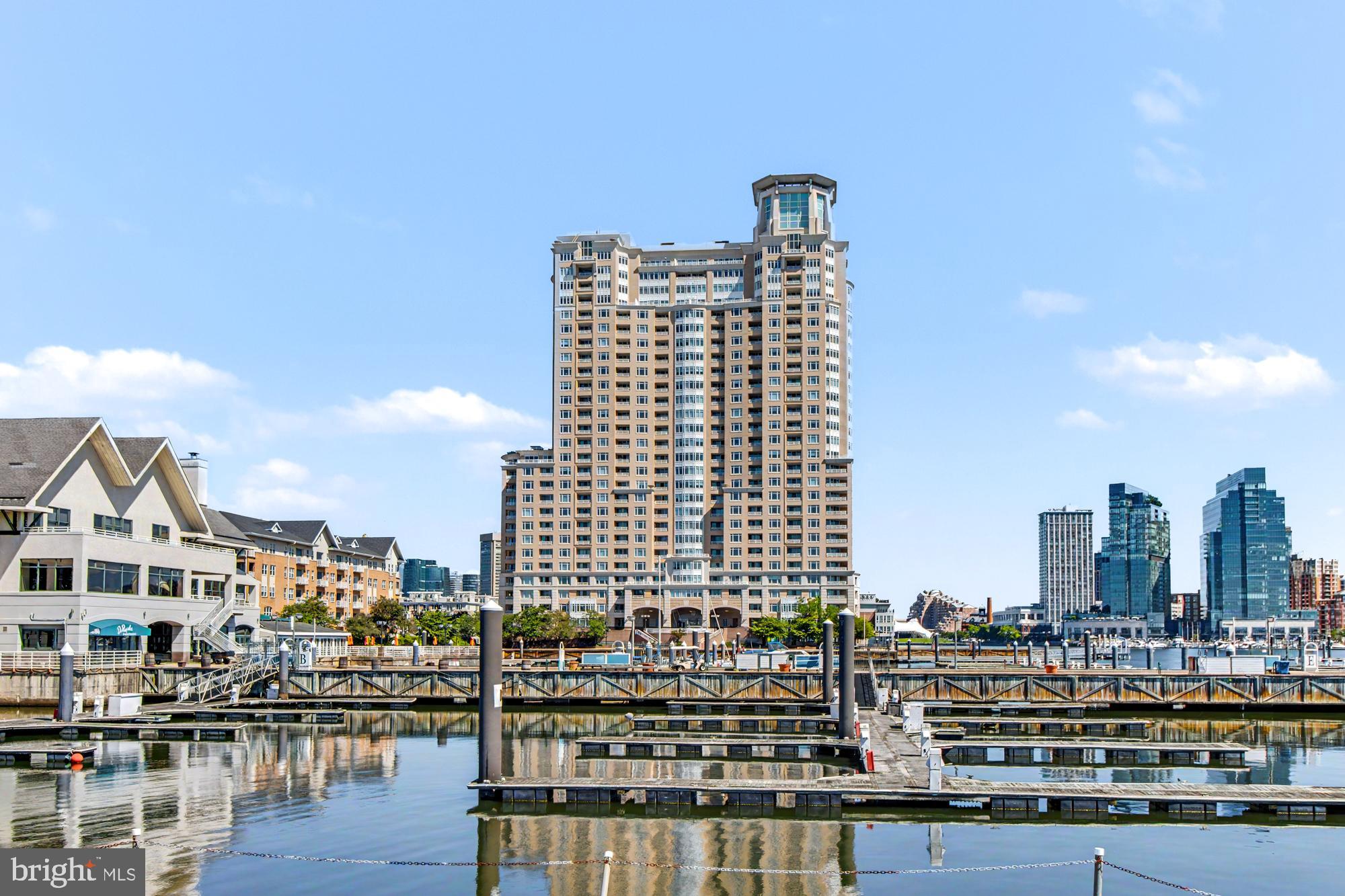 THE BEST VALUE IN HARBORVIEW! Experience the perfect blend of luxury, convenience, and vibrant city living in this stunning seventh-floor condominium. This unit offers a move-in-ready opportunity in one of Baltimore’s most sought-after waterfront communities.Step inside to an open and airy floor plan filled with natural light, complemented by fresh paint, updated lighting, and plush carpeting throughout. The spacious living room features floor-to-ceiling windows showcasing breathtaking views of the marina and water, with direct access to your private balcony—perfect for enjoying panoramic city and waterfront scenery.The kitchen is equipped with updated appliances, LED lighting, a double bowl sink, and durable ceramic tile flooring, offering both style and functionality. The primary bedroom serves as a private retreat with a walk-in closet, charming bay windows, and direct balcony access with skyline and marina views. The bathroom has been tastefully updated with a new vanity and a relaxing jetted tub.Residents of Harborview enjoy an unmatched suite of amenities including 24/7 concierge service, gated underground parking, indoor pool, fitness center, sauna and steam room, walking and jogging paths, guest suites, business center, social lounge, billiards room, and beautifully maintained grounds. Valet guest parking and 24-hour security provide added convenience and peace of mind.Ideally located within walking distance to top-rated restaurants, with easy access to the marina, Camden Yards, and M&T Bank Stadium, this home offers the ultimate in luxury city living.Come experience everything Harborview has to offer.