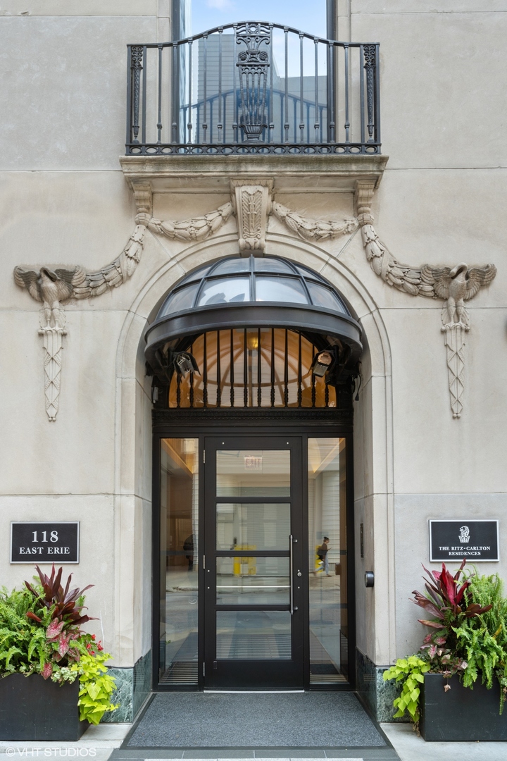 A Rare Opportunity at the Ritz-Carlton Residences Chicago.  One of only two residences on the 37th floor, this exceptional 3-bedroom +den, 3.5-bath home spans 3,661 square feet and offers an unmatched combination of privacy, luxury, and five-star service. Walls of windows fill the home with natural light boasting spectacular views of Lake Michigan, the Chicago skyline, and Michigan Avenue. Custom Lutron motorized shades and UV-treated windows provide effortless comfort throughout.  Designed with timeless elegance, the residence showcases 10-foot ceilings, arched doorways, extensive custom millwork, crown molding, wide-plank hardwood floors, custom built-out closets, and a Savant smart home sound system. At the heart of the home is a stunning DeGiulio-designed chef's kitchen featuring SieMatic cabinetry, Sub-Zero refrigeration, dual wine refrigerators, Wolf six-burner range with griddle and double ovens, Miele appliances, marble countertops and backsplash, custom glass shelving, and an oversized quartz breakfast bar. The thoughtfully designed floor plan includes two luxurious primary suites, each with spa-inspired marble and limestone baths, soaking tubs, oversized glass showers, and expansive custom walk-in closets. A spacious third ensuite bedroom and a seperate private den/office provide exceptional flexibility for guests or a home office. Enjoy both sunrise and sunset from two private terraces positioned on opposite sides of the residence. Additional highlights include in-unit laundry, concierge laundry service, deeded valet parking spot included in price, and two private storage rooms. Residents enjoy exclusive access to the Landmark Club, featuring elegant private salons, formal dining and cocktail lounges, a state-of-the-art fitness center, billiards lounge with wine storage, outdoor terrace, steam rooms, spa relaxation suites, private theater, along with 24-hour concierge, daily butler service, and Ritz-Carlton's legendary hospitality. An extraordinary residence offering the privacy of a boutique building with the world-class service and amenities only the Ritz-Carlton can provide.