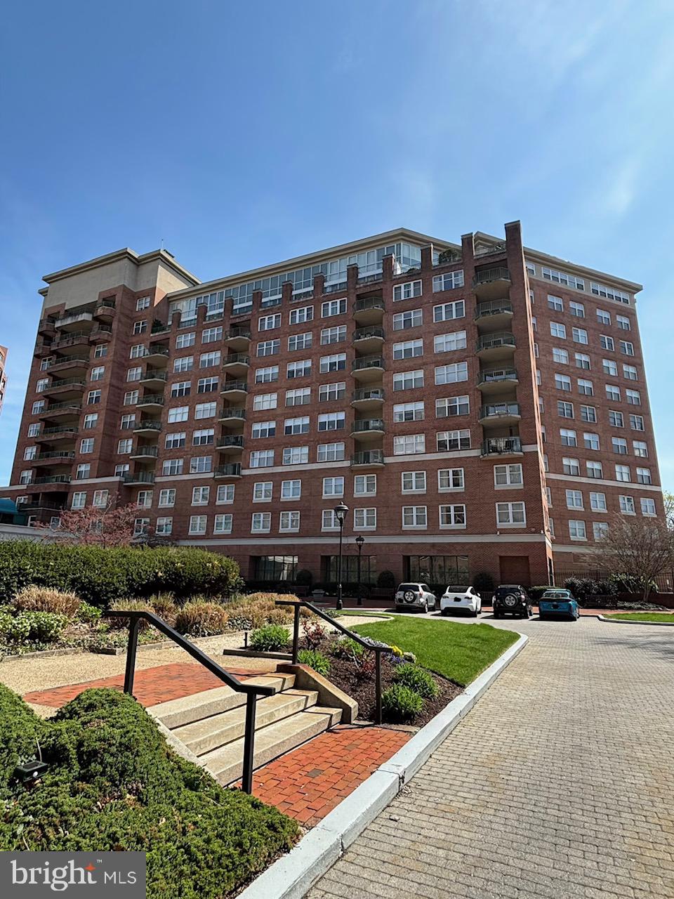 Homes that nurture. Enjoy easy, low-maintenance living in this peaceful condo across from Johns Hopkins University. Walk to restaurants, cafés, and shops while enjoying the security of controlled access, a private garage, 24/7 concierge and front desk service, and on-site management. The second bedroom features built-in Murphy queen bed and large desk, plus two closets, for instant move-in comfort. Guests can stay at the hotel next door. Comfort, convenience, and location come together beautifully in this exceptional home. Garage spaces are E19 and E20. Storage unit spaces are 124 and 125.