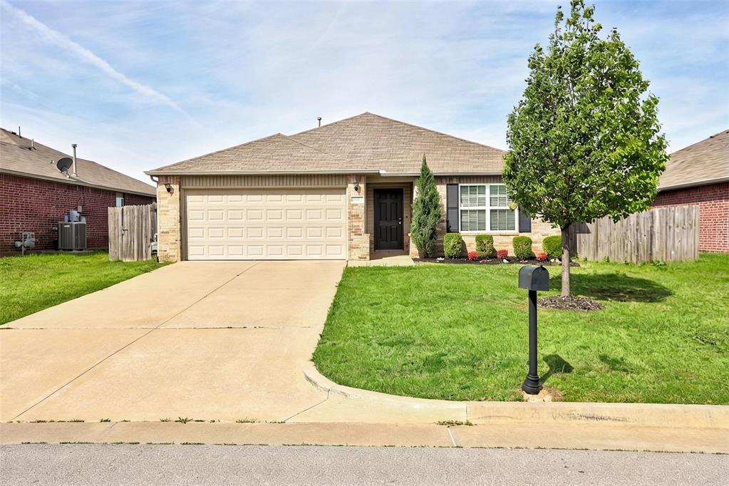 Welcome to the heart of The Village in The Crossings neighborhood. This newly established neighborhood with it's own entry is one of the most sought out areas in NW OKC. Just a short drive from Lake Hefner, Highway 235, The Turnpike, and Highway 74, this home is perfect for someone needing easy access to enjoy all of Oklahoma City's offerings. Step inside to find a spacious 3 bedroom, 2 bath, 2 car garage home. With loving updates such as hardwood flooring in the common areas, a brand new full house paint job, fresh landscaping, farmhouse sink in the kitchen, and hardware on the kitchen cabinets! Another plus is ALL appliances will stay with home (plus fridge, washer, dryer). Step outside to find MORE upgrades such as a back storm door, an oversized concrete entertaining area, and river rock on the side of the home to store trash cans or a shed. This home has been meticulously updated and maintained, it's just now waiting for YOU! Don't miss your chance to see it in person!