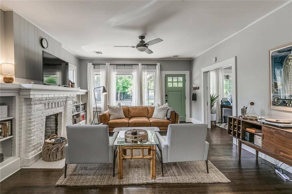 Welcome to this charming 1919 bungalow in the heart of Oklahoma City’s vibrant Plaza District—where historic character meets an unbeatable central location. Just moments from some of the city’s best restaurants, shops, and entertainment, this home offers a lifestyle that’s truly hard to match.Previously enjoyed as a second home and successful Airbnb, this property presents a unique opportunity—whether you’re looking for a fully furnished, turnkey residence or a seamless investment to continue as a short-term rental.Inside, timeless bungalow charm shines through with refinished hardwood floors, original built-ins, and a classic brick fireplace flanked by custom shelving. The flexible layout offers three bedrooms or two bedrooms plus a dedicated office—perfect for today’s lifestyle. Natural light pours through oversized windows, highlighting fresh neutral paint and thoughtful updates throughout.The kitchen blends style and function with sleek subway tile and stainless steel appliances, while the entertainer-friendly flow makes hosting effortless. Step outside to the quintessential covered front porch—ideal for morning coffee or evening unwinding.The exterior offers rare versatility with dual access parking—via the front driveway or rear alley—with ample space in the back for additional vehicles. The backyard is equally inviting, featuring a large wood deck and spacious lawn, perfect for entertaining or relaxing. There is also excellent potential to build a detached garage or accessory dwelling unit (ADU), adding even more value and flexibility to the property.Move-in ready, full of character, and positioned in the heart of the Plaza District with close proximity to dining, shopping, and entertainment—this is urban living at its finest in Oklahoma City.