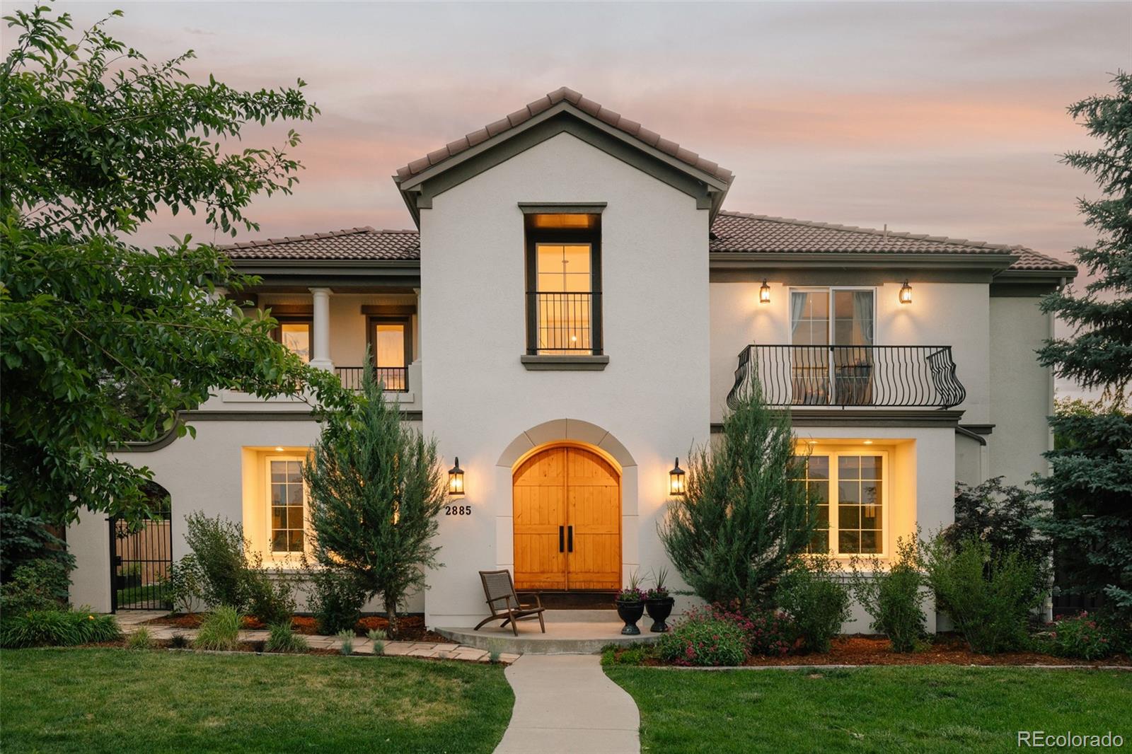 Positioned on a premier greenbelt-facing lot fronting Westerly Creek, this updated residence blends design, functionality, & energy efficiency. Surrounded by mature landscaping & 15 established trees, the home enjoys a private setting rarely found in Central Park. Fronting to open greenbelt space & plenty of space between the homes, the backyard offers privacy while remaining moments from parks, trails, & pools. The painted stucco exterior, wood entry doors, & architecture create a strong first impression. Inside, refinished hardwood floors, fresh paint, custom railings, lighting, arches, & expansive windows define the interior. The kitchen features white perimeter cabinetry, a statement island, upgraded appliances, designer tile, under-cabinet lighting, an eat-in nook, & a coffee & beverage station with beverage refrigeration & cabinetry. The living room centers around a fireplace & overlooks the courtyard & backyard. The formal dining room showcases a dry bar & floating shelves. Additional living spaces include a fireplace lounge, main-floor bedroom, bathroom, mudroom w/custom built-ins, & powder bath. Upstairs, the primary suite offers a spa-inspired bath with a freestanding soaking tub, steam shower, radiant heated floors, dual quartz vanities, & storage. A walk-in closet connects directly to the laundry room. A private office or sitting room w/fireplace & covered balcony overlooks the greenbelt. Two additional beds feature ensuite baths & walk-in closets. Outdoor living includes a covered pergola, raised garden beds, apple tree, rain barrels, & gas grill connection. The unfinished basement offers 9-ft ceilings, a theater setup w/projector & 120-in screen, plus pre-wire for a sauna. Upgrades include a fully owned 39-panel 14.585kW solar system, whole-home water filtration, heat pump HVAC w/gas backup, an 80-gallon heat pump electric water heater, smart irrigation, & app-controlled garage doors. An attached three-car garage completes the home.
