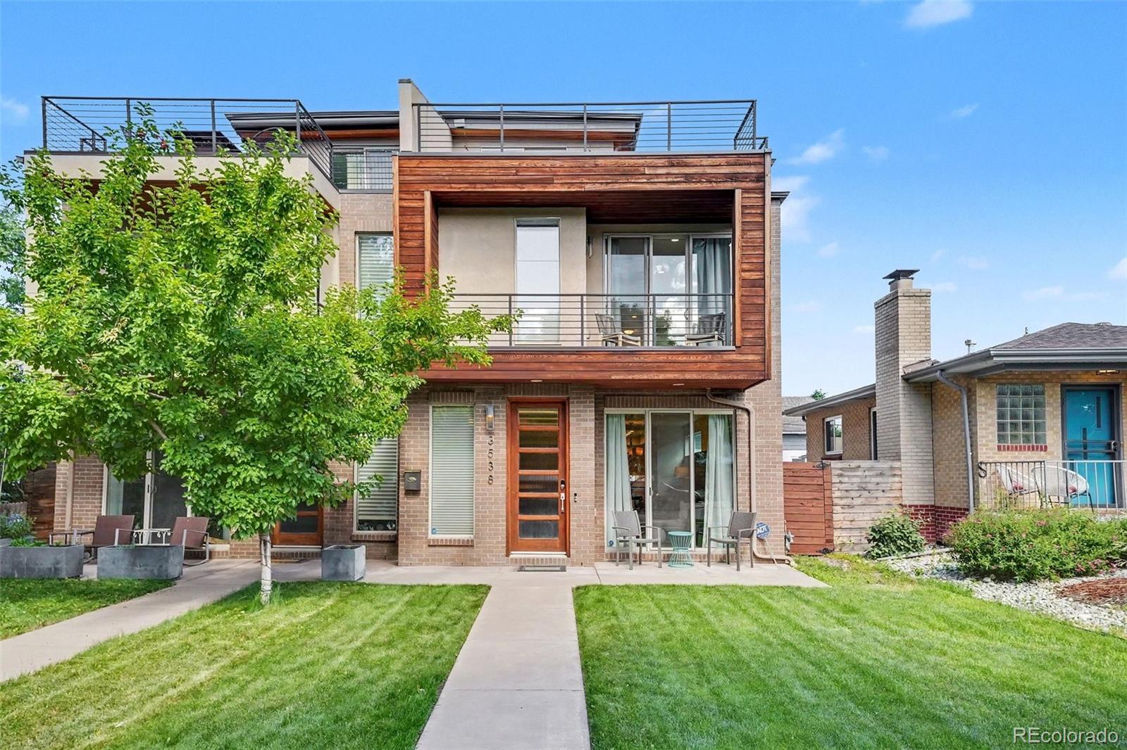 Experience modern Highlands living at its finest in this stunning 4-bedroom, 5-bath home, ideally situated on a quiet, tree-lined street in one of Denver’s most sought-after neighborhoods. Just three blocks from the vibrant shops, cafés, and restaurants of Highland Square and within walking distance of Tennyson Street, this exceptional residence offers the perfect blend of urban convenience, neighborhood charm, and contemporary design.Flooded with natural light, the open-concept floor plan features soaring ceilings, expansive windows, and thoughtfully designed spaces for both everyday living and effortless entertaining. The kitchen is the heart of the home, showcasing quartz countertops, an oversized island, stainless steel appliances, and designer lighting. The kitchen flows seamlessly into the dining and living areas, where a cozy gas fireplace creates a warm and inviting atmosphere.Upstairs, the spacious primary suite serves as a luxurious retreat, complete with its own fireplace, walk-in closet, California closets, private balcony and spa-inspired five-piece bath featuring a soaking tub and separate shower. A second bedroom and full bath complete the upper level, with conveniently located laundry just steps away.Crowning the home is an incredible third-floor retreat where you will find the third bedroom and a bonus space with a plumbed in wet bar area. Ideal for a gym, office, lounge, or entertaining space. There are two dedicated mini splits to ensure year-round comfort and built in California closets. The spectacular rooftop deck boasts sweeping views of Downtown and the Front Range.The basement offers exceptional flexibility - a large family room, the fourth bedroom and another full bath. There are also built in California closets ideal for storing all your tools and toys.Combining sophisticated design and versatile living spaces this is a rare opportunity to enjoy the very best of Denver living. Schedule your private showing today!