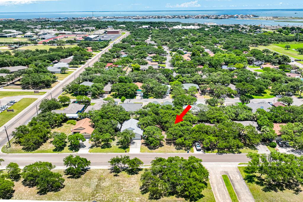 Build your dream home right in the middle of Rockport! This lot is near the community pool, a nice walk to Memorial Park, the high school, and the post office. The seller has installed a 200 amp service, so you are ready to start building! Buyers and agents should do their due diligence and verify with the city about restrictions and tap fees.