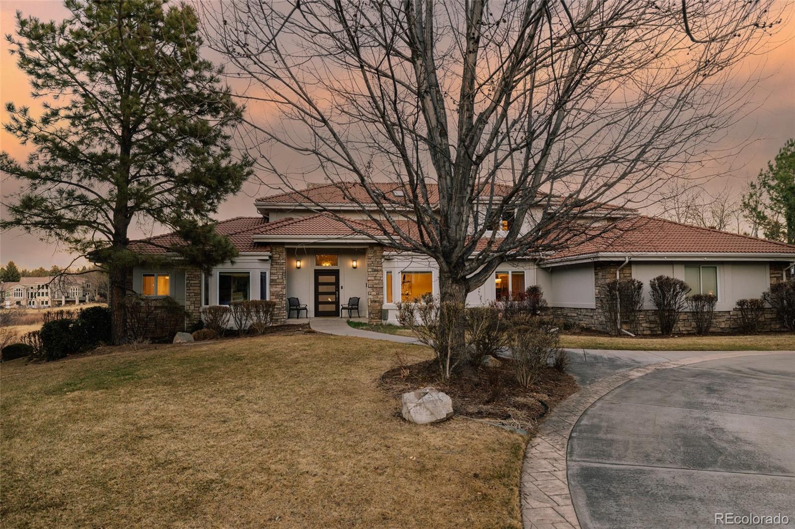 32 Years of Love Poured Into Every Corner of This Preserve Home! Some homes are simply meant to be cherished and this extraordinary Koelbel-designed and custom-built masterpiece in The Preserve is proof. Owned and lovingly cared for by the same family for 32 years, this residence offers 6 bedrooms and 7 bathrooms with a rare main-level primary suite, an elevator serving all levels, and rich hardwood floors throughout that speak to the quality and craftsmanship woven into every detail. Entertain effortlessly on the expansive deck overlooking the serene beauty of Greenwood Gulch, or head down to the walk-out basement with its own fenced-in area that’s perfect for pets, play, or quiet evenings outdoors. The generous yard offers room to breathe, garden, and gather, while the natural backdrop of the Gulch provides a sense of privacy and tranquility that is truly rare. Whether you're hosting a summer dinner party or enjoying a quiet morning coffee, this deck delivers the perfect backdrop for every occasion. Located in one of Greenwood Village's most coveted communities, residents of The Preserve enjoy access to a Jr. Olympic-sized pool, private tennis courts, and 71 miles of trails along the iconic High Line Canal — all just minutes from the rec center and everything Greenwood Village has to offer. This is more than a home. It's a legacy property, ready to welcome its next great chapter.