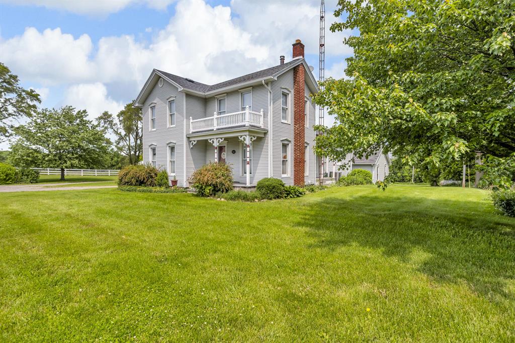 HOBBY FARM NW JACKSON COUNTY only 1.5 miles to I-94, Exit #133 - great for commuters. Peaceful setting surrounds this beautiful 4.5 acre farmette (possibly additional acreage available) - perfect for horses, chickens or other life stock, hobby farming, homesteading or simply enjoying wide-open spaces. Well maintained vinyl sided 1,900 sq. ft. home features 3 BR \ 2 BA, w/1 BR & bath on the main flr. Gorgeous custom BR furniture upstairs stays. Large nicely updated eat-in kitchen w/granite countertops. Formal dining rm, charming living rm w/wood burner, wood storage closet AND a parlor/library w/blt-in bookcases. 1st Flr laundry/mud rm (hidden door to basement). Relax in the vinyl/composite gazebo & enjoy views fields. 30x60 pole barn, ''run in'' barn, storage shed & 24x24 garage.  Enjoy the best of rural living without sacrificing comfort. FHA/VA/RD terms avail