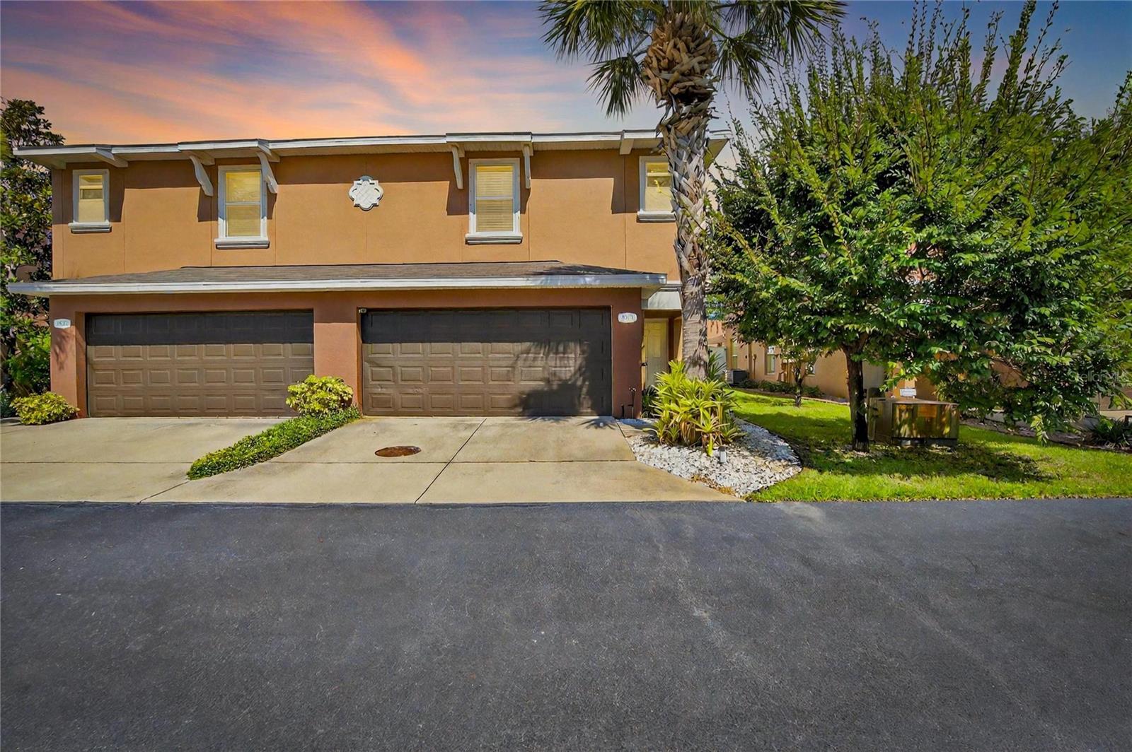 Discover the perfect blend of luxury and comfort in this stunning 3-bedroom, 2.5-bathroom, 2-car garage townhouse nestled in the heart of Tarpon Springs. Located in the serene neighborhood of The Townhomes of Brittany Park, this beautifully maintained property offers an ideal choice for families and individuals alike. Enter through the doors of this home and be amazed by the inviting open floor plan featuring neutral wall colors, an abundance of soaring sunlight, and numerous upgrades. The living and dining area provides ample space for relaxation and socializing, with large windows that provide views of the great outdoors. The spacious kitchen is a chef’s delight, boasting sleek granite countertops, upgraded appliances, ample cabinet space, and a convenient breakfast bar. Whether you're preparing a quick meal or entertaining guests, this kitchen is sure to inspire your culinary adventures. The master suite is a true retreat, offering a generous bedroom with a walk-in closet, an en-suite bathroom complete with a soaking tub, and separate shower. Two bedrooms are equally spacious and share a well-appointed bathroom. The custom patio and fenced backyard offers a picturesque setting for outdoor activities or peaceful reflection.  2025 Upgrades include new appliances, water heater, luxury Vinyl flooring, whole house water purifiction system and under the sink 6-stage reverse osmosis system, and much more. Enjoy the community pool and embrace the Florida lifestyle. Location, location, location… conveniently located in a sought-after neighborhood, this townhome provides easy access to shopping, dining, beaches, restaurants, sponge docks, historic areas, entertainment, and more. Legoland and Disney World is just under 2 hours by car. With its modern amenities and stylish finishes, this is a place you'll be proud to call home. Don't miss your chance to make it yours!