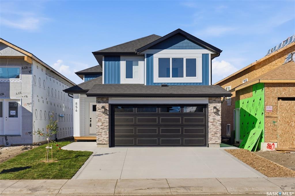 Great location with this Beautiful newly built house that is situated in the popular Kensington area of Saskatoon! Kensington has parks, walking paths, schools & close proximity to many amenities. This stunning newly built home is a 1251 sq. ft modified Bi-level with a double attached 23x20 garage and a finished 2-bedroom legal basement suite. The house boasts exceptional craftsmanship and attention to detail for anyone looking for a luxurious and comfortable living space. The main floor features upgraded 6.5mm vinyl plank flooring, it has a large foyer, open concept kitchen to dining/living area, a 4-piece bathroom, 2 good sized bedrooms and access to the garage as well as the utility room with plenty of storage. The 2nd floor of the home has a large primary bedroom that features a walk-in closet and a 3-piece ensuite bathroom. The basement has separate entry into a legal 2-bedroom basement suite. It features 2 bedrooms, a 4-piece bathroom, laundry, kitchen, living and dining area. There is the possibility to qualify for the Sask. SECONDARY SUITE INCENTIVE (SSI) Grant Program where the ministry of finance provides 35% of the total price to construct a new secondary suite at an owner’s primary residence, to a maximum GRANT of $35,000 per qualifying property. There will be a concrete driveway & front landscaping that has sod on one side with a tree and mulch on the other side included. Saskatchewan New Home Warranty is included. GST/PST is included in the purchase price with the rebate to the builder. Appliances are included. Do not wait! Call to view!