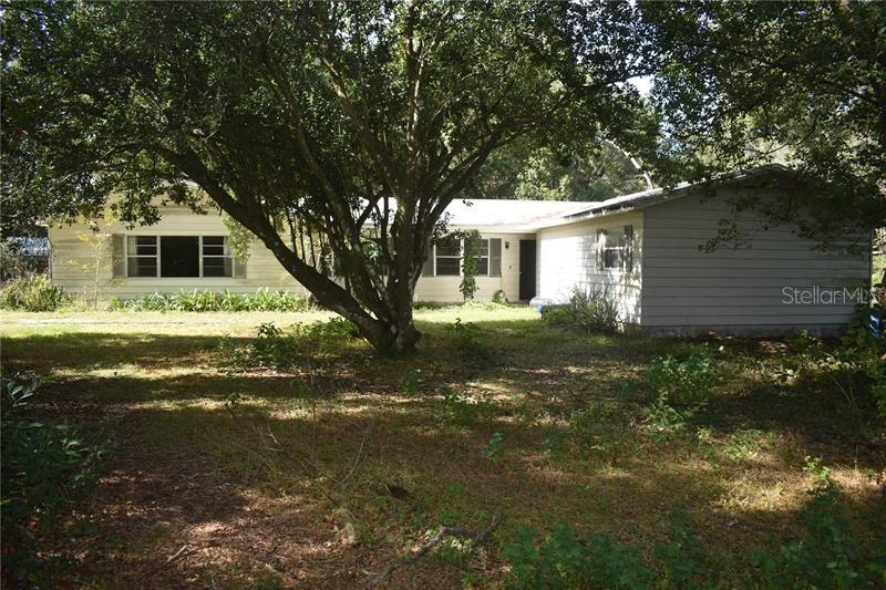 Major potential! This property on just under 4 acres in Zephyrhills offers tremendous potential for renovation or redevelopment. Features include a large detached garage with versatile space for workshops, storage, or hobbies. With ample land, there’s plenty of room for outdoor projects, gardening, or expansion. Don’t miss this opportunity to transform this property into a dream home or income-producing investment. Updated photos coming soon.