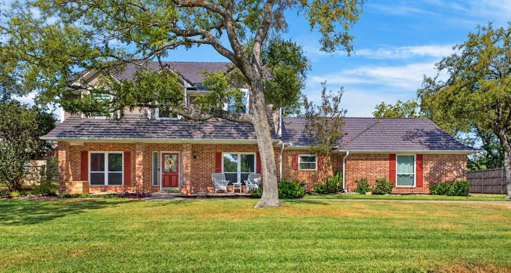 Welcome to 9470 Lechner Road—a one-of-a-kind property where lake living, incredible outdoor entertaining, and Texas-sized space come together.From the moment you arrive, you’ll notice the mature trees, peaceful setting, and views toward Eagle Mountain Lake. Step inside and you’ll find a beautifully maintained home offering flexible living spaces designed to fit the way you live. With 4 bedrooms plus an additional spacious room with a closet, there’s plenty of flexibility for a 5th bedroom, game room, media room, home office, or guest space.But the backyard is where this property truly shines.Imagine summer afternoons by the sparkling pool, evenings relaxing in the spa, and weekends entertaining friends and family in an outdoor kitchen that has just about everything—built-in grill, Big Green Egg, refrigerator, ice maker, and dual burners. There’s even a convenient poolside bath and shower.The property has also benefited from substantial improvements, including new windows, newer HVAC, electric shades, and metal roofing on the home, outdoor kitchen, and impressive two-story 20x20 storage building.And then there’s the lake lifestyle. Enjoy views of Eagle Mountain Lake from the front porch along with nearby dock access, boat parking, and reservable space—giving you another way to enjoy life near the water.And did we mention NO HOA?Whether you're hosting a crowd, spending a quiet evening by the pool, enjoying the lake, or simply appreciating the privacy and space around you, 9470 Lechner Road offers something increasingly difficult to find in the Fort Worth area.This isn't simply a home—it's a place to live, entertain, relax, and make memories for years to come.