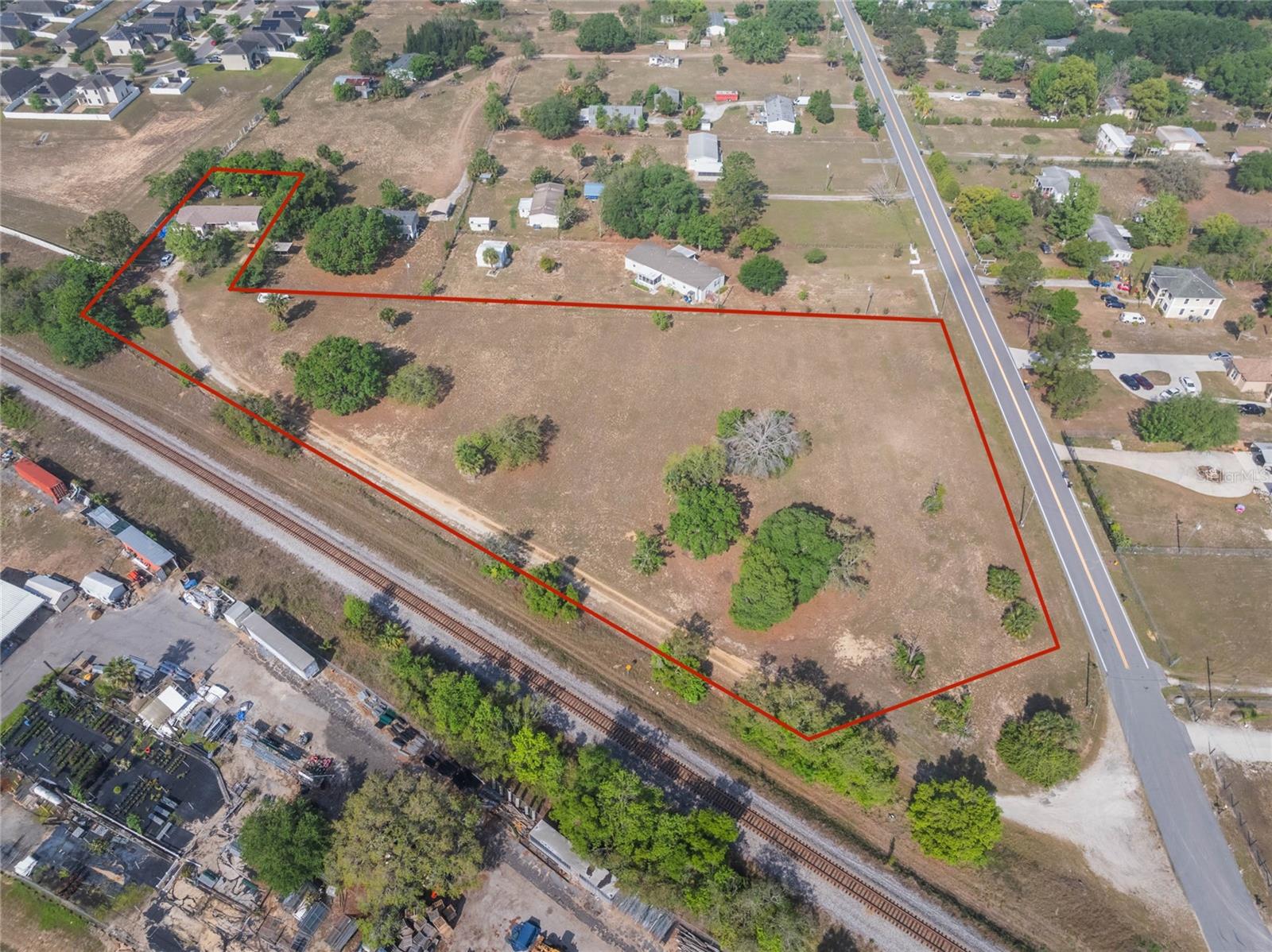 Opportunity awaits with this high and dry 3.66-acre parcel, ideally located in the heart of Central Florida! Currently zoned RE-1 with a future land use designation Residential Low (RL), this property allows for the construction of up to 4 residential units. Developers and investors will appreciate the potential to rezone to R-4 or R-5, which would increase the capacity to up to 18 dwellings, a rare find in such a desirable area. A single family home currently sits on the property, but the true value lies in the land and its exceptional potential. Just minutes from world-renowned attractions including Disney, Universal Studios, and a variety of top-tier shopping, dining, and entertainment options, this property offers unmatched accessibility to all that Orlando has to offer. Enjoy quick and convenient access to I-4, major airports, the SunRail Station, top medical facilities, and both the east and west coast beaches—making this location perfect for future development or investment. Don’t miss your chance to own this prime piece of Central Florida real estate—schedule your showing today! Sold as land value only