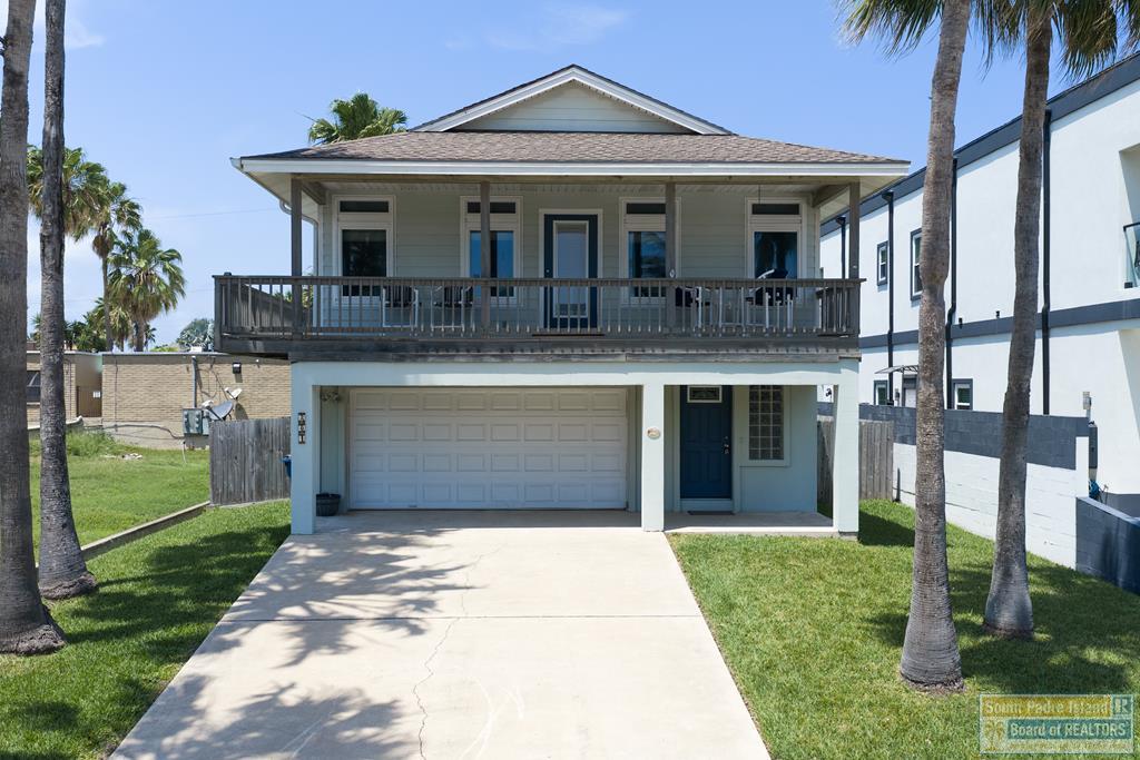 Charming coastal retreat offering Fully Furnished.  2 bedrooms, 2.5 baths, and approximately 1,514 square feet of living space. Enjoy the breezes from both front and rear balconies, creating an almost wraparound outdoor experience. The home features a spacious kitchen with abundant cabinetry and soft-close finishes, perfect for easy entertaining. Step outside to a covered patio, private pool, and lush yard with tropical foliage—ideal for unwinding after a day at the beach. A one-car garage provides convenient storage for a golf cart and all your beach essentials.