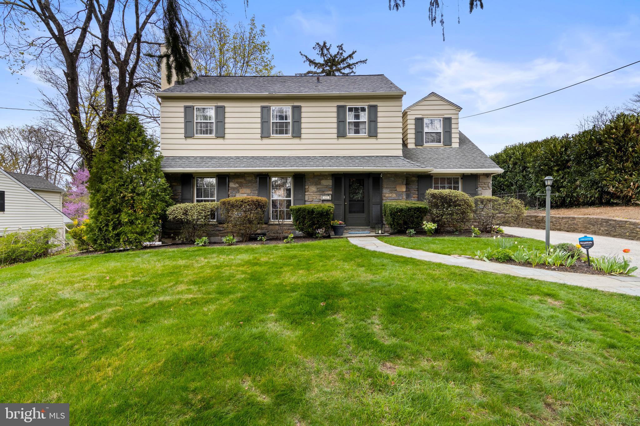 A rare find in the heart of walkable South Wayne, this charming 4 Bedroom, 2/1 Bath Colonial sits on a scenic 1/3-acre lot and offers the perfect blend of classic character, comfortable living space, and an unbeatable location. Step inside to a welcoming layout featuring a spacious Living Room with a fireplace—ideal for relaxing or entertaining. A dedicated first-floor Office with a wall of built-in bookshelves provides the perfect work-from-home space (or playroom/guest bedroom). The large Dining Room flows beautifully for gatherings and opens through glass doors to a flagstone patio overlooking the picturesque backyard.The bright Kitchen offers solid wood cabinetry, granite countertops, new stainless steel frig, dishwasher and microwave, ample counterspace with breakfast bar seating, a breakfast room, and a built-in desk/bar area —perfect for casual dining, work, or entertaining. Just off the Kitchen, the sun-filled Family Room provides wonderful additional living space with a second fireplace and ample storage.Upstairs, the Primary Bedroom features a walk-in closet and an updated en-suite Bath. Three additional Bedrooms share a Hall Bath. The large unfinished Basement, with high ceilings and walk-up access to the side yard, offers excellent storage and excellent potential for future finished living space. An oversized detached two-car Garage adds even more storage and convenience.Located within walking distance to shops, restaurants, schools, parks, and train stations, this home offers unparalleled convenience in the highly ranked Radnor School District. Enjoy easy access to the Blue Route, Center City, medical and corporate centers, and the Airport, while also being just steps from beloved local events like South Wayne Porchfest, the Wayne Music Festival, Radnor Fall Festival, and Wheels of Wayne. This is a rare opportunity to own a beautiful home in one of Wayne’s most sought-after neighborhoods.