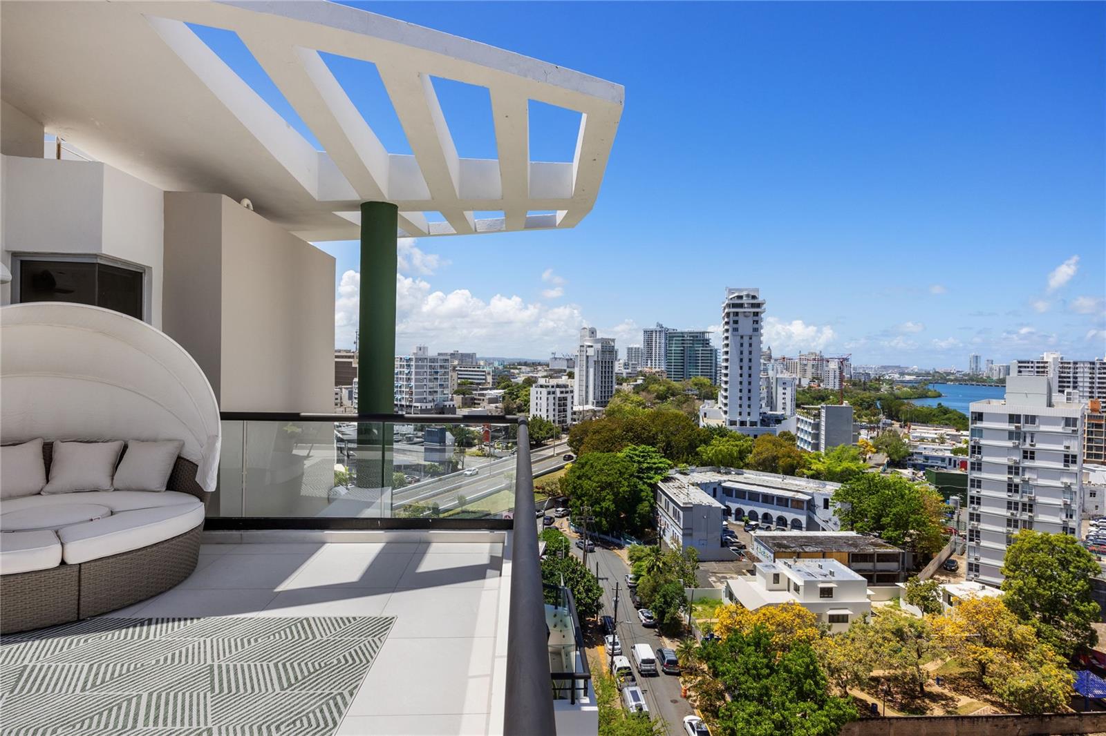 Experience a residence where  smart living, and resort-style comfort come together in one of San Juan’s most desirable neighborhoods. This exceptional penthouse offers far more than a home — it delivers a lifestyle defined by privacy, elegance, and breathtaking surroundings.Positioned with a coveted north-facing orientation, the residence captures stunning city and ocean views through dramatic floor-to-ceiling windows that fill the interiors with natural light and accentuate the soaring ceilings. Designed for both everyday comfort and elevated entertaining, the home features integrated smart technology powered by Control4, allowing seamless control of lighting, audiovisual systems, air conditioning, and window treatments.The expansive primary suite serves as a private sanctuary, complete with a distinctive spa-inspired bathroom bathed in natural light and framed by beautiful views. The suite also enjoys direct access to the penthouse’s second-floor terrace, where sleek glass railings enhance the panoramic scenery stretching from the Atlantic Ocean to the city skyline.Currently configured as an impressive wellness retreat, the secondary living area combines the original second and third bedrooms into a luxurious wellness room featuring a steam shower and a jacuzzi with both hot and cold therapy options for ultimate relaxation and rejuvenation. For added versatility, this space can easily be reconfigured to its original layout of two separate bedrooms and two full bathrooms, offering flexibility to accommodate guests, family living, or additional private suites.The rooftop terrace crowns the residence with spectacular panoramic views, creating the ideal setting for entertaining, sunset gatherings, or peaceful moments above the city. The elevator access both floors of the Penthouse, 11th and 12th. This penthouse offers modern luxury, wellness, and intelligent design in the heart of Condado. Contact us today to schedule a private showing and discover this extraordinary property firsthand.