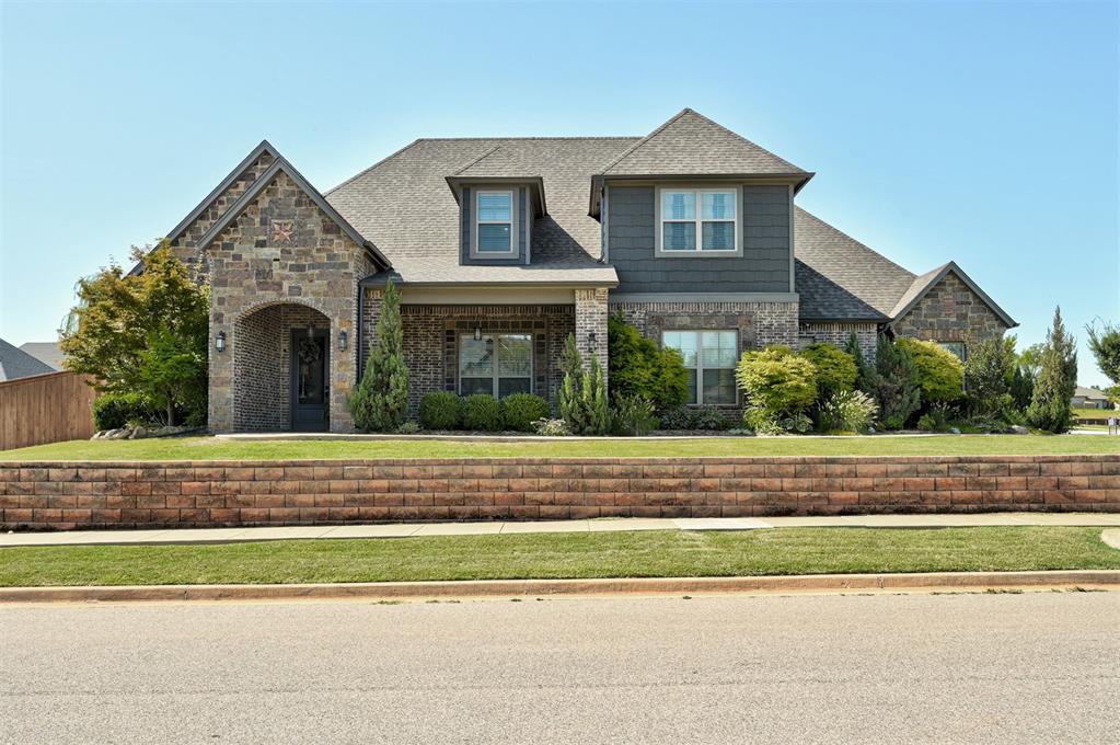Welcome to 2017 Providence Drive—an exceptional home situated on a spacious corner lot in the highly desirable Hallbrooke community of NE Norman. This move-in ready beauty offers 3,900 square feet of thoughtfully designed living space, featuring 5 bedrooms, 3.5 bathrooms, a dedicated study, media room, and game room. The chef’s kitchen impresses with granite countertops, a massive island, 6-burner gas cooktop with griddle, convection oven, and built-in microwave. Just off the kitchen, you’ll find a private bar with its own ice maker and sink—perfect for hosting. Comfort meets efficiency with a whole-house geothermal HVAC system, built-in surround sound, and a full security system with cameras that will remain with the home. Step outside and enjoy your personal backyard oasis, complete with a sparkling swimming pool and diving board, relaxing hot tub, outdoor fireplace, and a fully equipped outdoor kitchen with built-in grill. Hallbrooke residents enjoy access to top-notch amenities, including a beautiful clubhouse, scenic walking trails, private ponds, and a resort-style community pool with waterfalls and lap lanes. Ideally located near I-35, the University of Oklahoma, shopping, and University Town Center, this home offers the perfect blend of luxury, comfort, and convenience. Don’t miss your chance to make it yours!