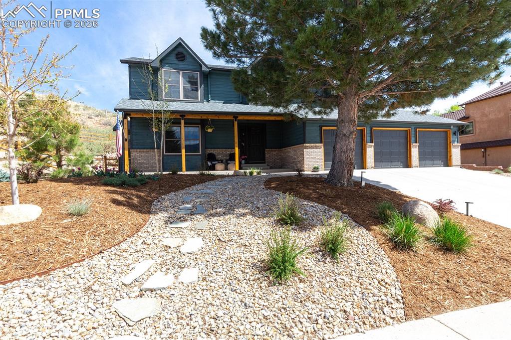 Spectacular Mountain Shadows beauty with stunning curb appeal and amazing 360 views that has undergone a complete transformation outside and many impressive updates inside over the last 3 years! Property includes three spacious, upper-level bedrooms plus a large flex space perfect for a home office, 4th bedroom or kids’ play area. The 25’x14’ primary suite is sure to impress, inviting a magical, personal retreat with a separate sitting area, fireplace, and private balcony with city and foothill views. The primary ensuite bath enjoys an abundance of natural light with a skylight, walk in shower with floor to ceiling tile, double vanity, quartz counters & separate water closet. Two other spacious upper level bedrooms have ample closet space and share a 2nd updated full bath with skylight. The upper level laundry is perfectly situated between the bedrooms making this chore more convenient. The focal point of the main level is the gorgeous, fully remodeled kitchen with all new cabinets, contemporary tile backsplash, new stainless steel appliances, new pantry space, new sink & faucet, and beautiful quartz counters with breakfast bar that connects the kitchen to the spacious breakfast nook with bay window for informal dining. Family & friends have space to spread out with a front living room and separate dining room inviting moments for shared meals and memories.  The main level family room off the kitchen enjoys a fireplace and walkout to the rear yard. The unfinished basement is an open canvas perfect for more bedrooms, home gym or whatever you imagine. Sellers have remarkably transformed the exterior with extensive new landscaping, new rear fencing, & new irrigation system (sprinklers & drip). New exterior paint makes the home pop like the gem that it is! Deck space atop the lot allows for unbelievable 360 views of Pikes Peak, the cityscape & surrounding foothills. Chicken coop (if desired) stays. Heated 3 car garage with 220V & brand new water heater. A MUST SEE HOME!