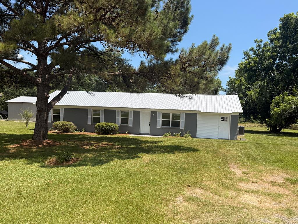 Great 3BR/1.5 Bath home on Hwy. 319! Classic brick home on nearly a full acre of land. Enjoy peaceful country views in this beautifully remodeled home. Recent improvements include enhanced curb appeal, enclosed carport, and newly enclosed washer and dryer room. Ready for you to move right in!  Call your favorite agent TODAY for a closer look!