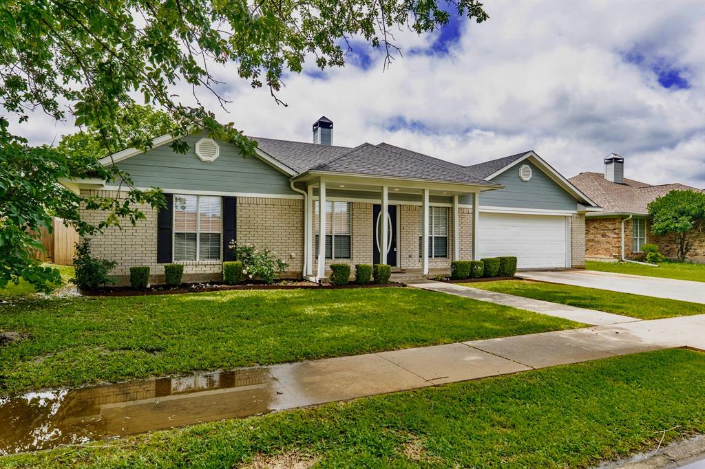 **SELLER OFFERING CREDIT TOWARDS CLOSING COSTS** Come see this updated 3 bedroom, 2 bathroom, with 2,109 square feet, tucked inside Woodbridge Crossing subdivision! There is a bonus room off the kitchen that would be a great home office, home gym, kids playroom, or den. A wood-burning fireplace, recessed lights, and wood laminate floors make the living room a great space. From a bright and fresh kitchen, with light tile and cabinets, you’ll find granite countertops, an island, and stainless steel appliances.  The primary bedroom includes a trey ceiling, wood laminate flooring, ceiling fan and bathroom with split double sinks, ceramic tile, and walk-in closet. For additional privacy, the primary bedroom is split from the guest bedrooms. A spacious backyard comes with a large covered gazebo and wood privacy fence. Your lawn will be easier to care for with a built-in sprinkler system. Bring your fishing poles to the community lakes and enjoy a picnic under the covered pavilion!