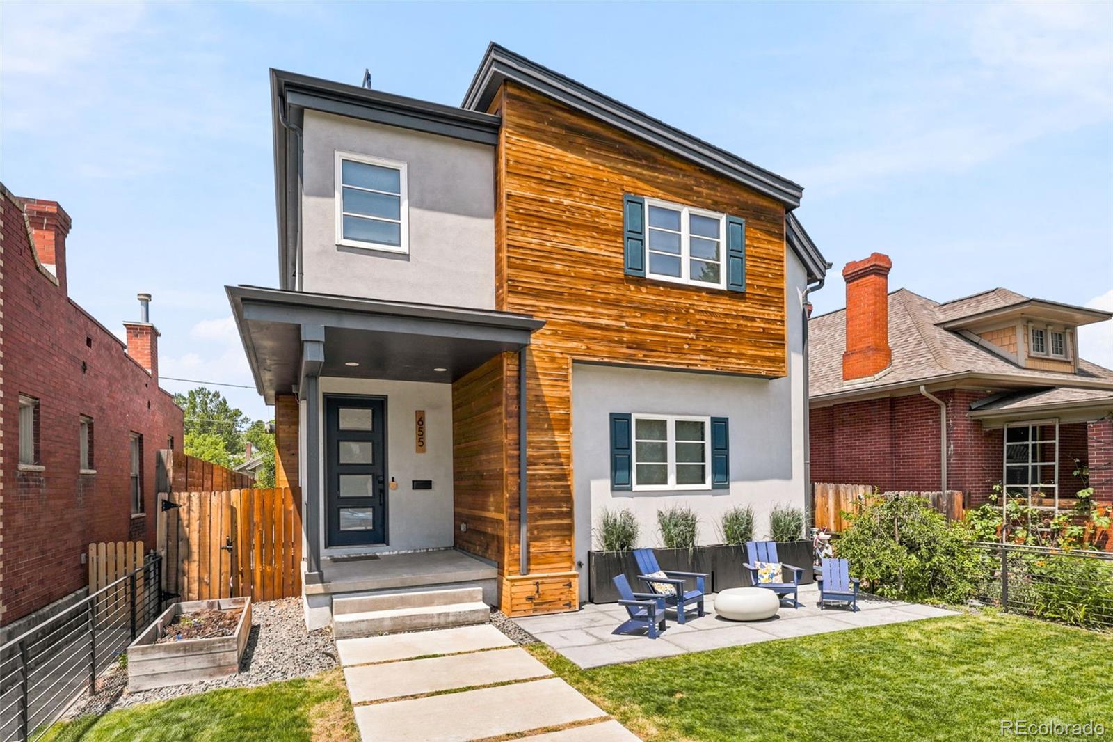 Rarely do homes like this become available in West Wash Park. This newer single-family home showcases contemporary architecture on a quiet, tree-lined street just 4 blocks from Washington Park. The inviting front yard features a modern wrought-iron fence, a new patio, & professionally designed landscaping. Everything (apart from one wall) was new in 2018! The main level offers open-concept living, dining, & kitchen. The kitchen features a large island, contemporary cabinetry, stainless steel appliances, & generous storage. High ceilings & abundant windows fill the home with natural light, enhanced by its southern exposure. This level also includes a private office (or conforming bedroom) with french doors, a gorgeous chandelier, & striking wallpaper, a 3/4 bathroom, & a mudroom with built-ins for easy storage. Upstairs are three spacious bedrooms and three bathrooms. The primary feels like a true retreat and includes an 5 piece en suite bathroom and large walk-in closet with custom built-ins. Continue up one more level to the incredible rooftop deck, where you'll enjoy sweeping mountain views. The finished basement offers a comfortable second living area, a playroom or flex space, a fifth conforming bedroom currently used as a gym, & an additional large 3/4 bathroom. The west-facing backyard is equally impressive, featuring a spacious composite deck with custom shade & heaters, a lush grassy lawn, a beautiful sauna, & an oversized 2.5-car garage complete with built-in storage. Additional bonuses: zoned heating & cooling (2 AC units & 2 furnaces), Aquasauna whole-house water purification system, custom window treatments, heated toilets, heated floors in the primary bathroom, large closets with built-ins, rooftop deck with composite decking & shade sails with mountain & city views, 9-foot privacy fence, newly planted trees, & built-in planter boxes. Truly an amazing opportunity to own one of the nicest homes in one of Denver's most coveted neighborhoods!