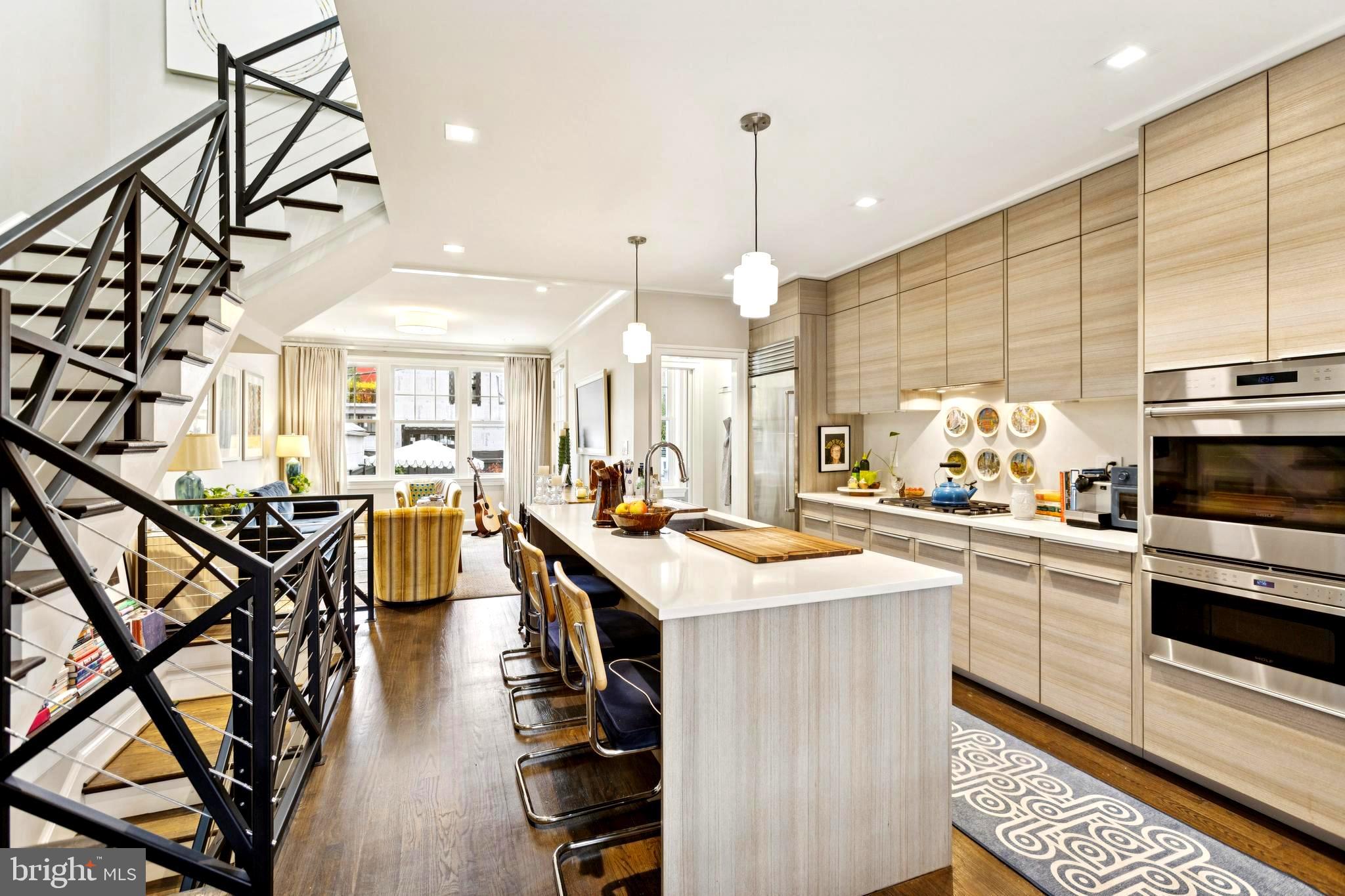 Incredible Value!  Georgetown is Washington’s oldest and most celebrated neighborhood, offering steps to public transportation, Safeway, Trader Joes, Starbucks, many many boutiques.. Nestled in the heart of the incredible Georgetown neighborhood, 1725 34th Street Northwest offers an exquisite blend of historic charm and modern sophistication. This elegantly renovated townhome, features three bedrooms and three luxurious bathrooms. The expansive interior presents wide-plank hardwood floors, expansive outdoor space, and a gourmet kitchen with stainless steel Miele appliances and quartz countertops. This home ensures effortless urban living with a parking pad and remarkable walkability to Georgetown's vibrant retail and dining scene.The spectacular renovation seamlessly integrates contemporary comforts within a classic structure, creating an inviting atmosphere perfect for both relaxation and entertaining. Whether enjoying a quiet evening on the quaint patio or exploring the lively neighborhood, this property represents a rare opportunity to embrace a truly distinguished lifestyle. This is more than a home; it is a testament to elegant living in one of Washington, DC's most revered locales.