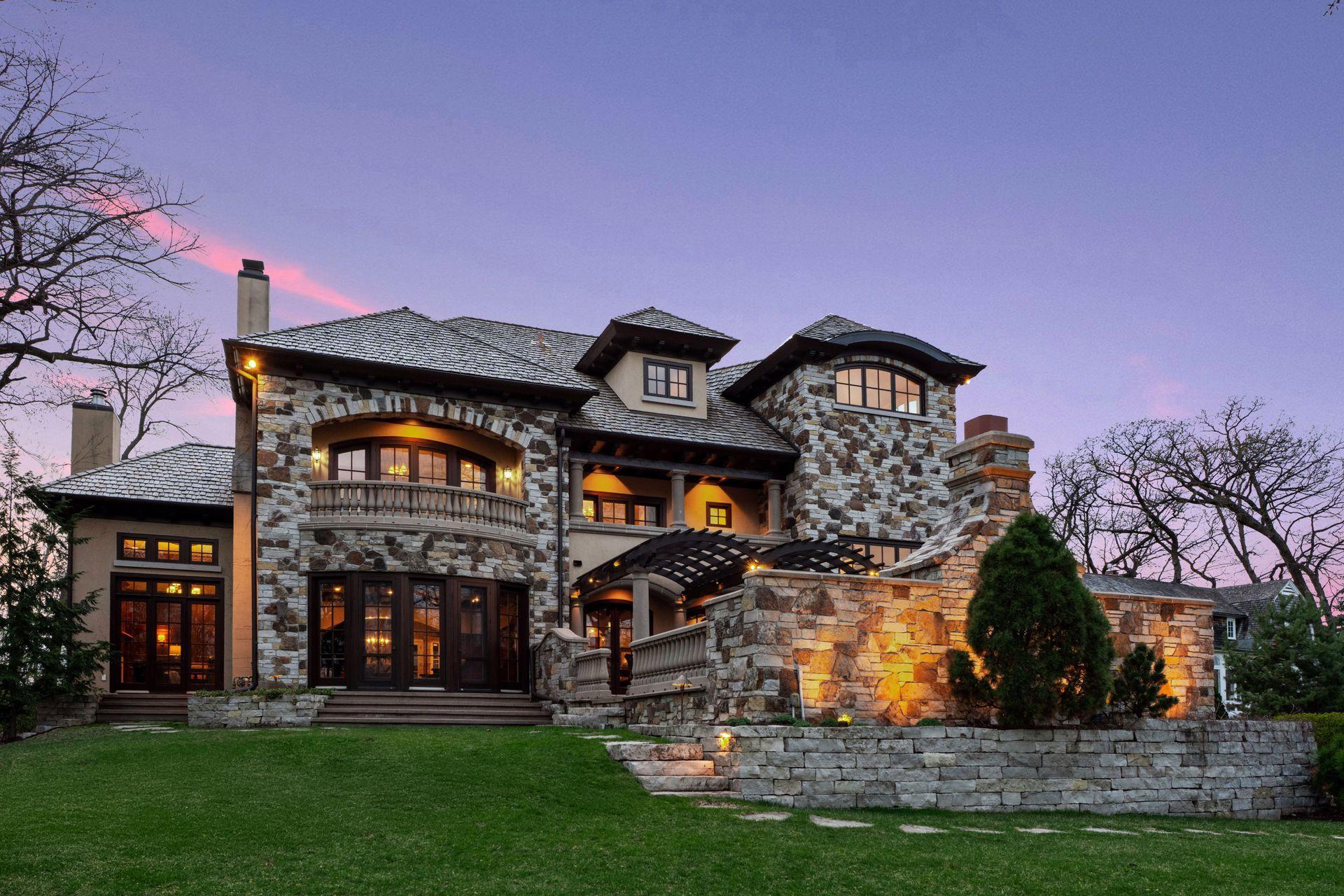 A home like no-other! Truly one-of-a-kind. An incredible location providing an unparalleled combination of lake and country club views, yet complete privacy. The condition is absolutely perfect, pristine…better than new. The architecture achieves a commanding profile, proudly situated overlooking Bde Mka Ska and the historic fairways of the Minikahda Country Club, while creating a warm, intimate and inviting home ideal for both entertaining and the ultimate in comfortable living. There is nothing like it! This home has every imaginable feature. A sports court, an elevator, a remarkable carriage house complete with a lower level golf simulator. Masterfully situated on a remarkable lot achieving natural light, sweeping views and blending both interior and exterior spaces to optimize each amazing exposure. Top tier materials have been used throughout. Stunning, French Bleed walnut flooring, marble, granite and custom cabinetry throughout. Sumptuous bathrooms, spacious bedrooms, inviting balconies, and every imaginable gathering space for formal events or a full range of recreation. This residence achieves what is seldom possible in a desirable city location…you can truly have it all!