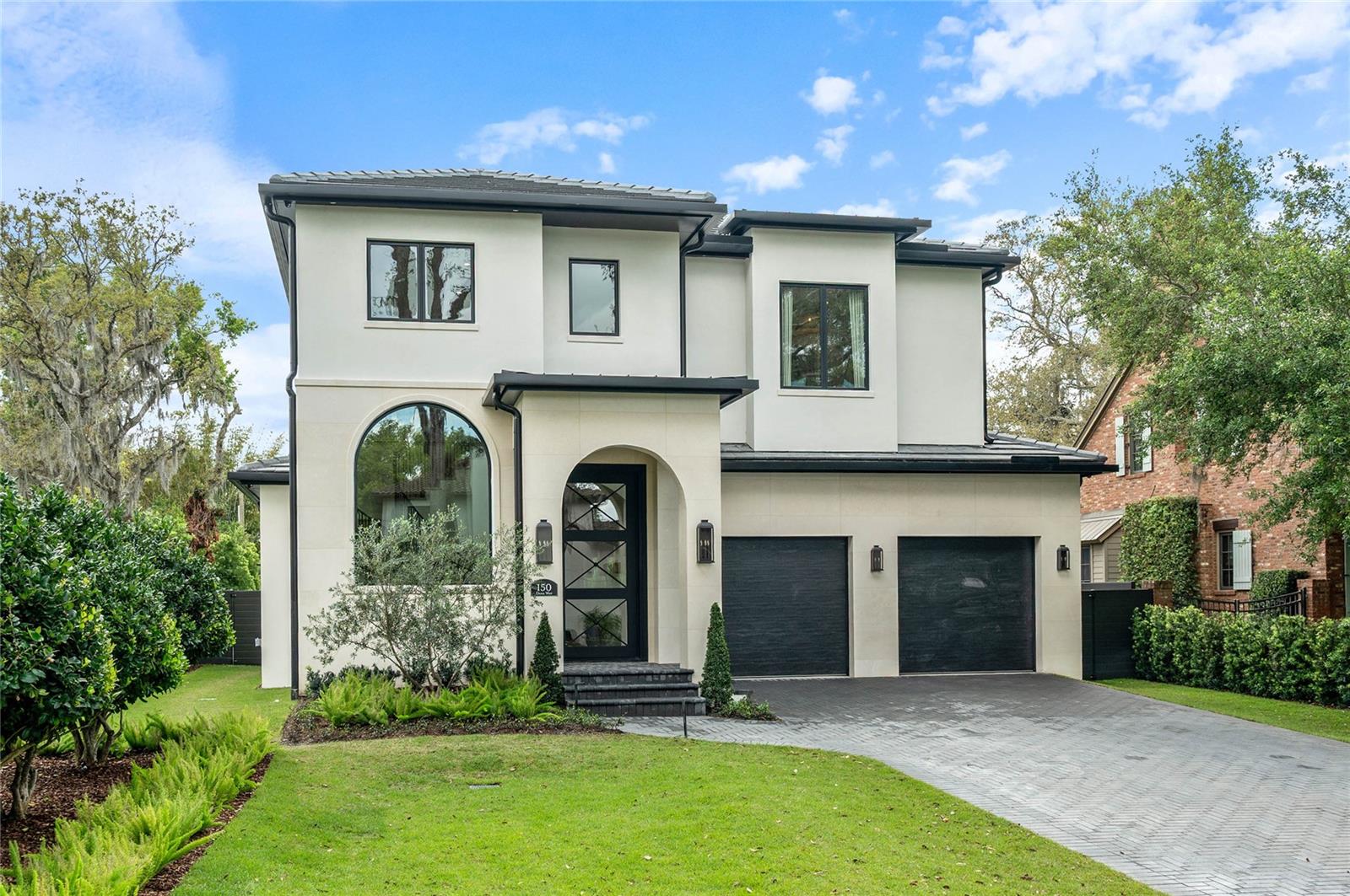 JUST COMPLETED....WINTER PARK / LAKE SUE DISTRICT — A TRUE STANDOUT IN TODAY’S LUXURY NEW CONSTRUCTION MARKETProudly presented by RARE Builders, a name synonymous with design-forward custom homes that continue to help set and raise the standard in Orlando and Winter Park, this newly completed residence represents a rare opportunity to secure a fully realized custom home in one of the area’s most sought-after neighborhoods.Positioned just steps from Lake Chelton and Lake Sue, and located within a highly desirable Winter Park school district, the setting delivers an exceptional lifestyle in one of Central Florida’s most dynamic and tightly held areas.While new construction inventory exists in today’s market, this home stands apart offering a fresh, cutting-edge architectural vision brought to life through exceptional planning, material selection, and execution. Prominently sited on an elevated homesite with a striking front elevation, the home offers 4,500 square feet of living space, including nearly 3,000 square feet on the ground level alone... a rare and highly functional configuration.The layout is both expansive and intentional, featuring multiple large living spaces, a private ground-floor primary suite, and a well-appointed guest suite/study/flex space. Upstairs, each bedroom is thoughtfully designed with either an en-suite bath or direct access to a full bath, delivering both comfort and privacy throughout.The defining feature of this home...and one rarely seen in the market... is the massive Renlita Floataway door system, which opens an entire wall of the home to seamlessly connect the interior Florida room with the resort-style outdoor living environment. This creates a true four-season entertaining space, transforming the way the home lives and offering a level of indoor-outdoor integration that is both dramatic and highly functional.The outdoor setting is designed as a private resort, complete with a pool, spa, fire and water features, pergola, and summer kitchen... all curated to complement the home’s architectural vision.Inside, the level of finish and design is exceptional. From breathtaking Venetian plaster walls to a dramatic two-story foyer, the home is defined by a refined and highly curated selection of materials, fixtures, and hardware. Every element has been intentionally sourced and executed, resulting in a level of craftsmanship and aesthetic cohesion that is rarely achieved and immediately recognized by discerning buyers.A well-appointed kitchen with walk-in butler’s pantry and thoughtfully designed secondary spaces further enhance both function and livability. Integrated Control4 home automation, audio, and security systems complete the offering.Located just minutes from Downtown Orlando, Winter Park, Park Avenue, Winter Park Village, AdventHealth, and Orlando Health, this home delivers a rare combination of location, design, and execution at the highest level.This is not simply new construction, it is a distinct, design-driven custom residence offering a level of detail, presence, and livability that is truly rare in the current Winter Park market.