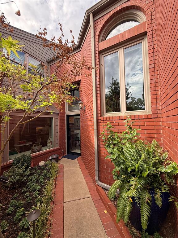 Stunning modern remodel in the exclusive, gated enclave of The Commons near Nichols Hills! This beautifully updated condominium features sleek contemporary finishes, high-end details, and a seamless open floor plan. Perfectly situated in a quiet, safe, and private community, this home offers an incredibly peaceful environment alongside effortless lock-and-leave living. Enjoy a secure gated entrance, manicured common grounds, and close proximity to premier shopping and dining. Modern luxury meets unparalleled peace of mind—schedule your tour today!