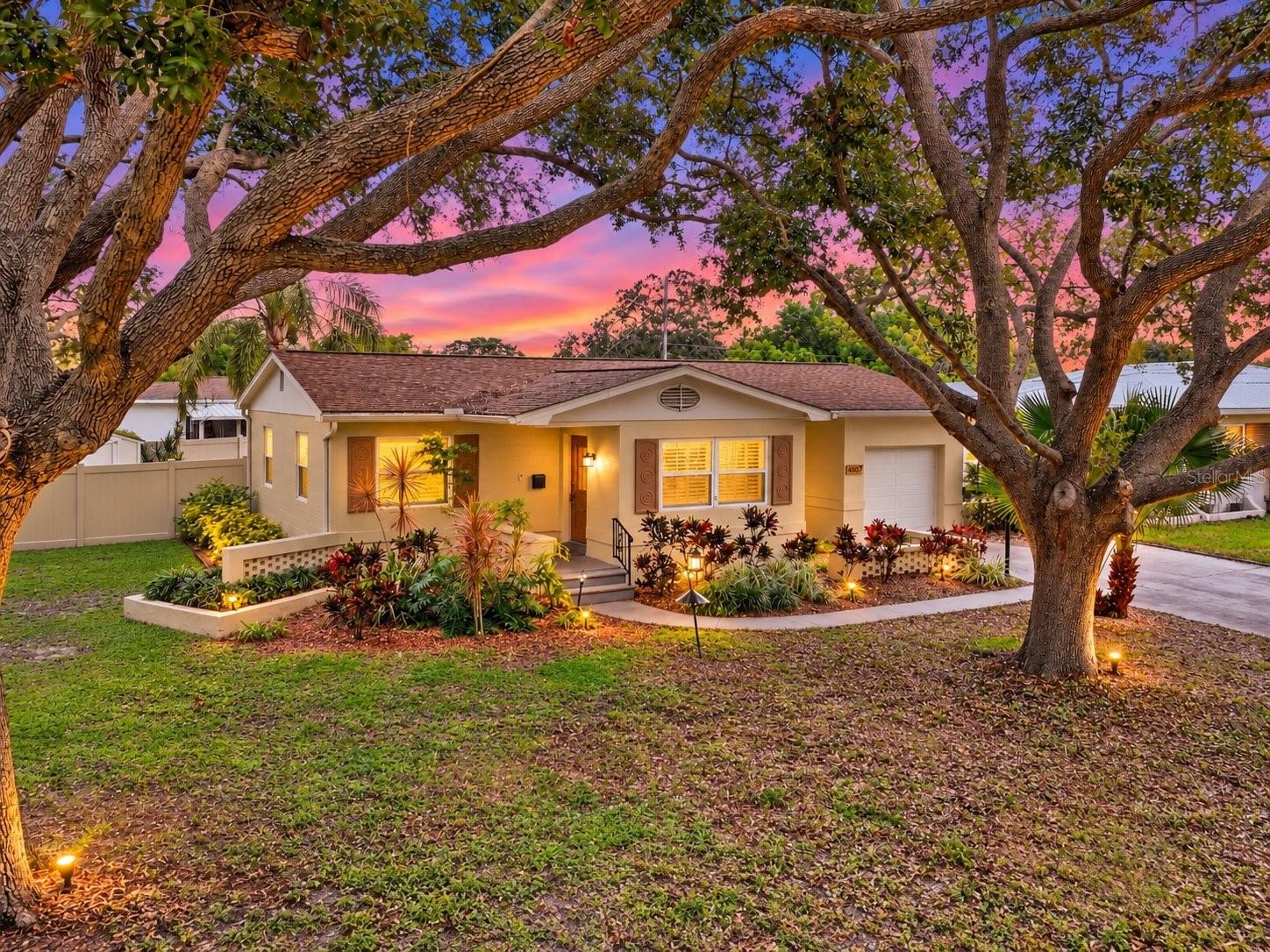 Welcome to this wonderfully updated Disston Heights pool home, perfectly situated on a spacious corner lot in the heart of St. Petersburg! Offering a blend of classic character and modern updates, this move-in-ready gem features an open floor plan with ample natural light, beautiful hardwood floors and charming cove ceilings in the large living room. An arched doorway leads seamlessly from the living room to the dining area and a well-appointed kitchen complete with stainless steel appliances, shaker cabinets, granite countertops and a classic tile backsplash. Both bedrooms are generously sized, providing comfort and versatility.Step outside into your private outdoor oasis! The expansive covered lanai overlooks a large, sparkling pool with a full screened enclosure, making it the perfect spot for morning coffee or evening relaxation. The spacious, fully fenced yard features a new tan vinyl fence and a large Tuff Shed for ample storage. Major mechanical big-ticket items have already been done for you, including a new roof and AC (2020), newer double-paned vinyl windows, pool pump and gutters as well as a wind-rated garage door and opener (2023). The expanded front driveway offers plenty of off-street parking leading to the attached 1-car garage, and the corner lot position provides excellent potential to add a gate for RV or boat parking.Location is everything! You are less than 15 minutes from award-winning Gulf beaches, 10 minutes from bustling Downtown St. Pete’s fine dining, shopping, the Pier, and world-class museums. With quick 5-minute access to I-275, commuting to Tampa International Airport is a breeze. Plus, you are just 5 minutes away from two area recreation centers featuring pickleball and tennis courts, playgrounds, and baseball fields. Don't miss your chance to own this spectacular St. Pete home!