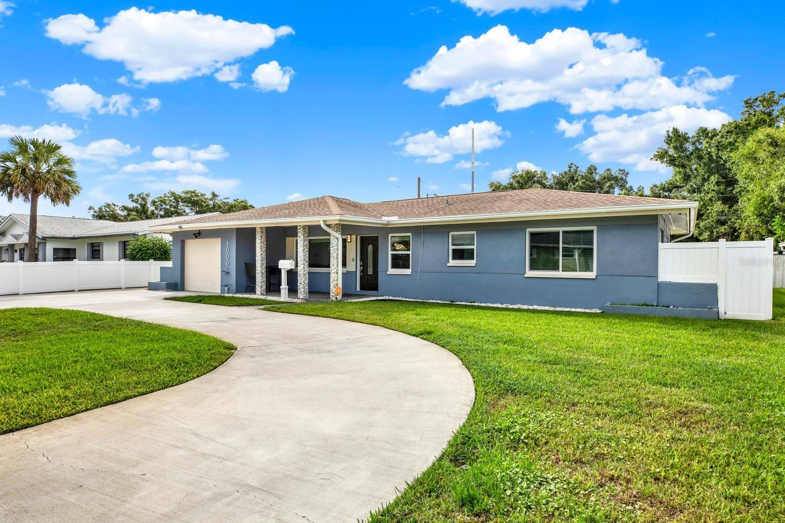 Bring your toys and move right in! This beautifully renovated 3-bedroom, 2-bath block home delivers modern style, thoughtful upgrades, and the St. Pete lifestyle you’ve been looking for. Located less than 5 miles, or approximately 10 minutes, from Downtown St. Petersburg and just 1 mile, or about 3 minutes, from Bay Vista Park and the bay, this home puts you close to the water, dining, entertainment, parks, and everything St. Pete has to offer.Step inside to a bright, modern interior featuring impact windows, recessed lighting throughout, porcelain tile and luxury vinyl plank flooring with no carpet, and designer finishes throughout. The living room makes a statement with a beautiful stone accent wall and built-in surround sound, creating a stylish space for relaxing, movie nights, or entertaining.The gourmet kitchen features an LG Knock-Knock InstaView refrigerator, wine refrigerator, updated appliances, mosaic tile backsplash, granite countertops, soft-close cabinetry, Lazy Susan storage, and plenty of space for cooking and entertaining.Retreat to the spacious primary suite and spa-inspired bathroom, complete with a rainfall shower head, sleek round LED vanity mirror, and modern finishes. The additional bedrooms offer flexibility for family, guests, a home office, or extra flex space.Outside is where this property really stands apart. Bring the boat, trailer, jet skis, or other toys! The rear double-entry gate provides convenient backyard access and extra storage flexibility. The property also includes an irrigation system and a detached shed with full electrical, perfect for a workshop, hobby space, or additional storage.Additional upgrades include a full smart-home security system. This solid block home is move-in ready and located in Flood Zone X. Schedule your showing today!