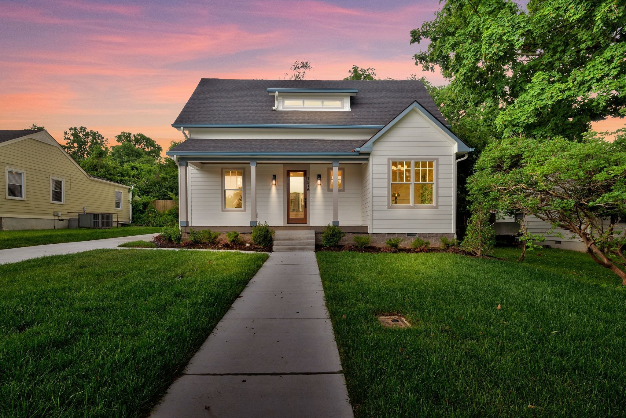 Gorgeous new build in the heart of East Nashvilles, Eastwood Neighbors. Fully equipped with a Detached guest house above a 2 car garage, this stunning home was built to the nines with designer finishes by locally renowned design firm, Quinn and Co. From the formal dining room with coffered ceilings to the state of the art Kitchen, huge pantry, wine Bar, 1st floor primary suite, huge upstairs bonus room, designer lighting, gorgeous millwork and much more, all while being steps away from dozens of East Nashvilles best restaurants including Noko, Cafe Roze, Yellow Table, Two Ten Jack and many more. Don't miss this amazing home in one of the most charming pockets in East Nashville. Ask about the Builders 2% interest buy down credit!!!
