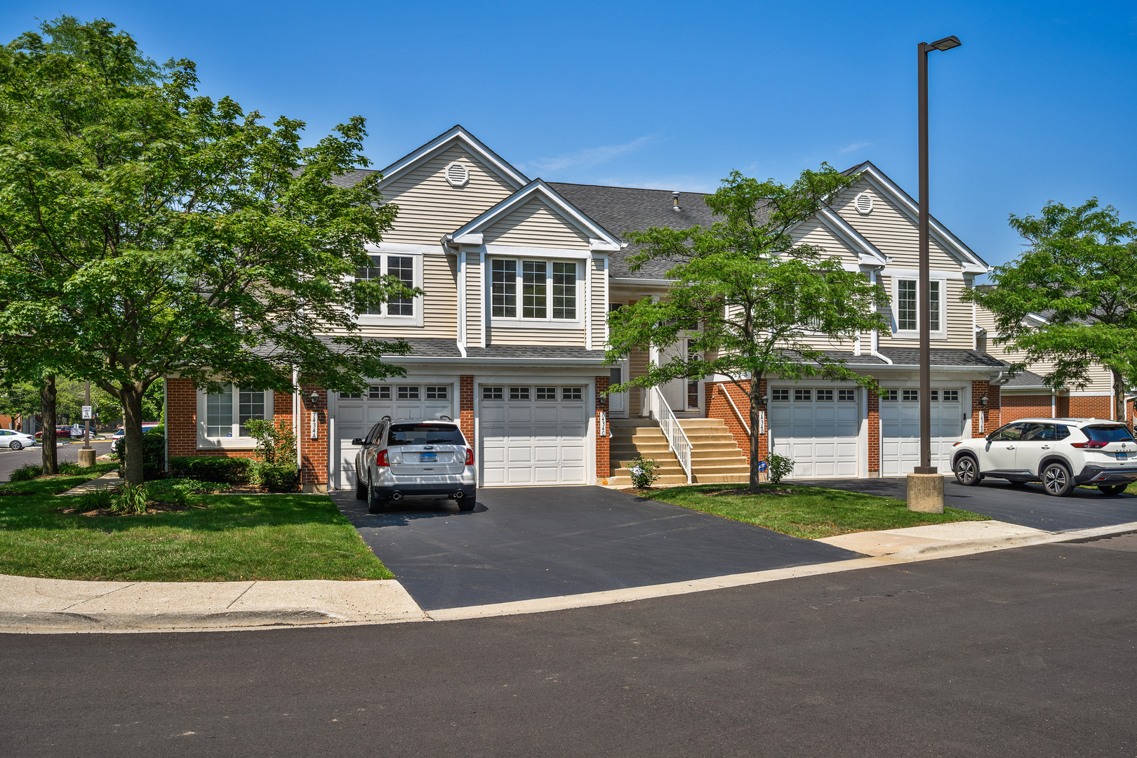 LIVE LARGE! Welcome to this stunning, rarely available, extra-large, 3 bedroom plus den/2 bath Carriage home (all on one level) in Lincoln Ridge Development.  Home has had one owner keeping place meticulously clean.   Enjoy formal entertaining with the amazing living/dining room space.  Large primary bedroom suite, two large secondary bedrooms, separate laundry room. Den could easily be 4th bedroom.   Enjoy your morning coffee/lunch/dinner on  balcony off the kitchen.  Entrance is on main level leading to attached 1-car garage and stairs to the unit.  Recent improvements in unit:  hot water tank 2020, microwave under five years, ac under 5 years.  Roof was done between 2018-2021. Association improvements:  Trex decks, new streets, additional guest parking. This home has low exterior maintenance. Too good to be true.*Den can be converted to a 4th bedroom or open Kitchen to Great Room. Pet limit: 2.