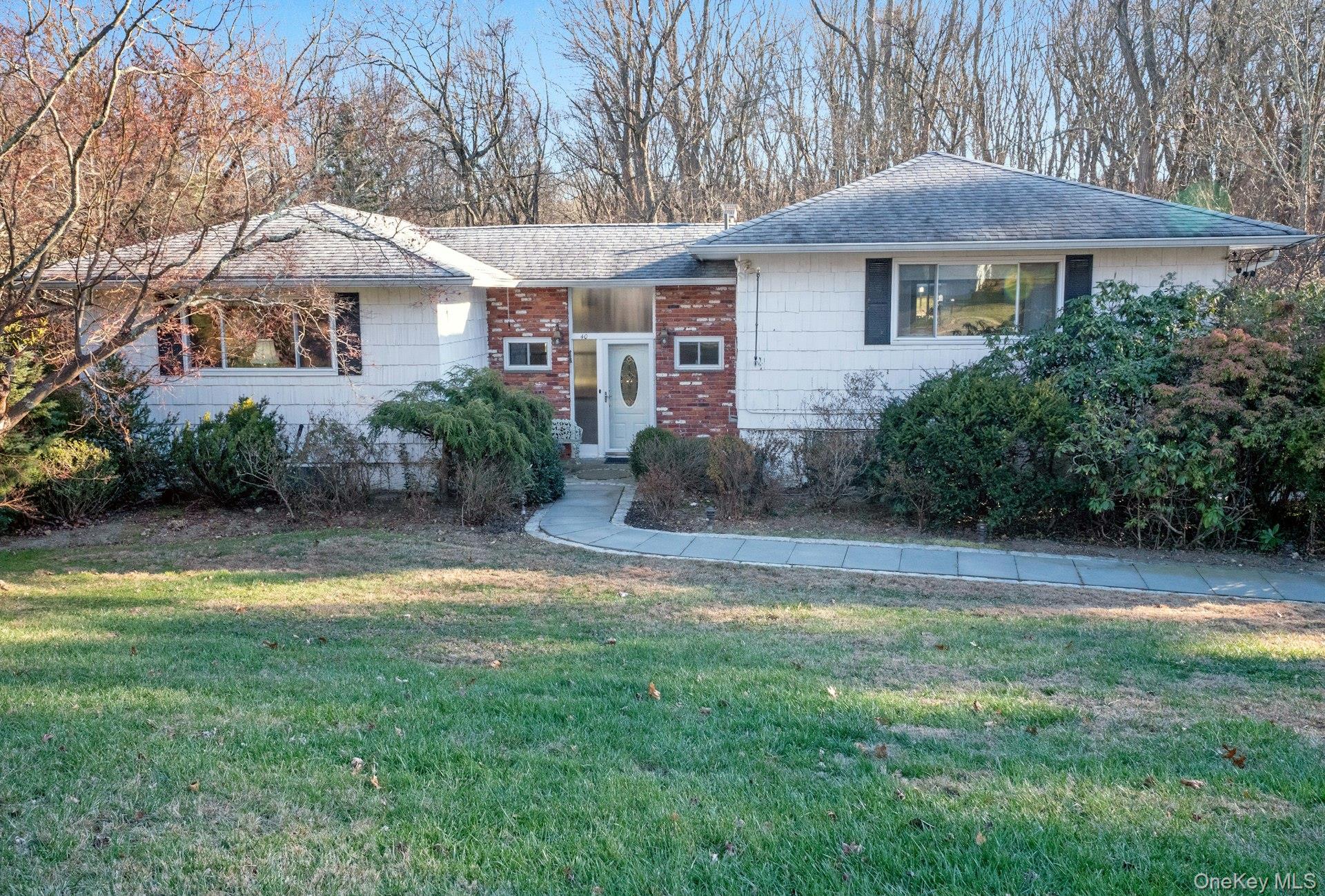 Spacious Expanded Raised Ranch.. Charming Neighborhood and a Quiet Cul-de-sac Location.. 1/2 Acre with a Private Flat Usable Backyard and Wooded Views.. Updated Kitchen with Stainless Steel Appliances and a Gas Range, Plenty of Cabinets and Pantry, Granite Counters, Recessed Lighting and a Door Out to the Deck.. Formal Dining Room with a Wall of Windows, Great Natural Light and a Sliding Glass Door to the Deck with Awning and Steps Down to the Yard.. Large Living Room with Picture Windows and a Coat Closet, Steps up from the Entry Foyer and Powder Room.. 4 Bedrooms and Hall Bathroom Accessible from the Primary Bedroom with Picture Window and Walk in Closet.. Mostly Hardwood Flooring on the Main Level and a Hallway with Pull Down Stairs to Attic Storage.. Large Lower Level Family Room and Sun Room with Floor to Ceiling Windows and a Sliding Glass Door Out to the Backyard.. Recreation Room, also Perfect for Guest Accommodations with Access to a Full Bathroom and a Storage Room with a Cedar Closet.. Additional Lower Level Space Includes a Landing with Closets, 2 Home Office's, a Storage Room with Shelving Built in's and an Entrance Foyer from the Driveway with Plenty of Parking.. Gas Fueled Furnace, Central Air Conditioning and a Lawn Sprinkler System.. Easy Access to the Briarcliff - Peekskill Trailway's Hiking.. Minutes to the 1,000 Acre Teatown Lake Reservation Preserve and Hudson Hills Golf Course.. Convenient to All in the Charming River Towns of Ossining and Croton.. Shopping Centers, Dining and Deli's, Schools and Libraries, Parks and Recreation, Train Stations.. All Close, with Quick Access to Major Highways and an Easy NYC Commute.