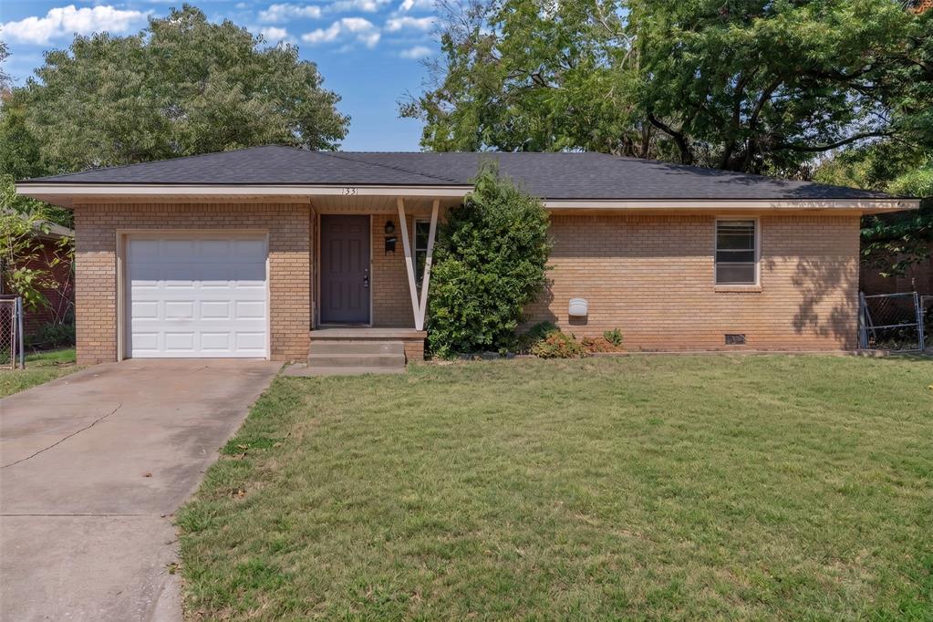 Just minutes from the University of Oklahoma, this inviting Norman home combines charm, natural light, and a convenient location. Large windows throughout the home fill the space with sunshine, while wood flooring adds warmth and character. The updated bathroom features modern tile for a fresh, stylish touch. Outside, enjoy a welcoming covered front porch and a spacious backyard surrounded by mature trees that provide plenty of shade and a peaceful setting. Conveniently located near OU, shopping, dining, and major Norman thoroughfares, this home offers an ideal blend of comfort, character, and accessibility.