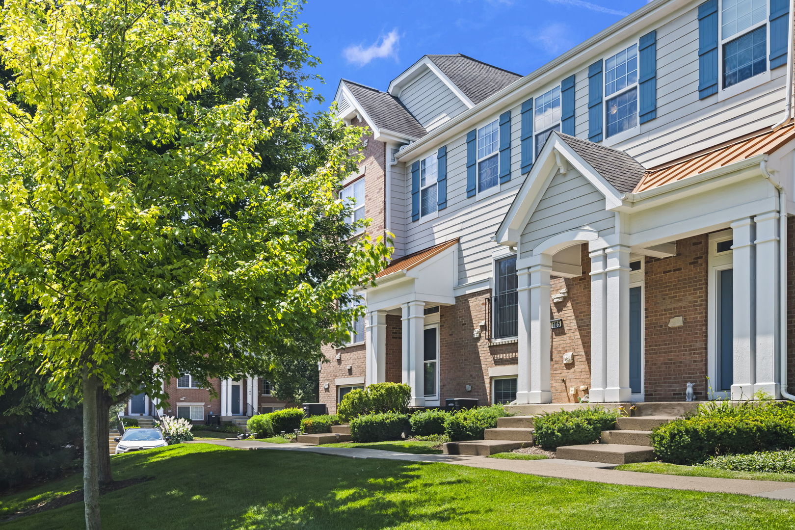 Welcome home to this beautifully maintained townhouse in Meadow Wood. Step inside to find gleaming hardwood floors that flow throughout the entire main level. The bright eat in kitchen is a standout feature, showcasing 42 inch white cabinetry, stainless steel appliances, a stylish glass tile backsplash, center island and pantry closet. Just off the kitchen is a deck to enjoy your morning coffee or just relax after a busy day. The open concept living and dining areas provide the ideal space for everyday living and effortless entertaining. A convenient first floor laundry room and half bath add to the home's functionality. Upstairs the spacious primary suite offers a large walk in closet and a private bath featuring a double vanity and separate shower. Two additional bedrooms and a full bathroom complete the 2nd level. The finished basement provides valuable additional living space and is perfect for a family room, home office, fitness area, or recreation room. The spacious two car garage with epoxy floor is just off the family room. Enjoy peaceful pond and nature preserve views right from your front door, complete with a scenic paved walking path and gazebo that creates a truly tranquil setting. Meadow Wood is just minutes from shopping, dining, entertainment, and Lifetime Fitness. This exceptional home combines comfort, convenience, and beautiful views.