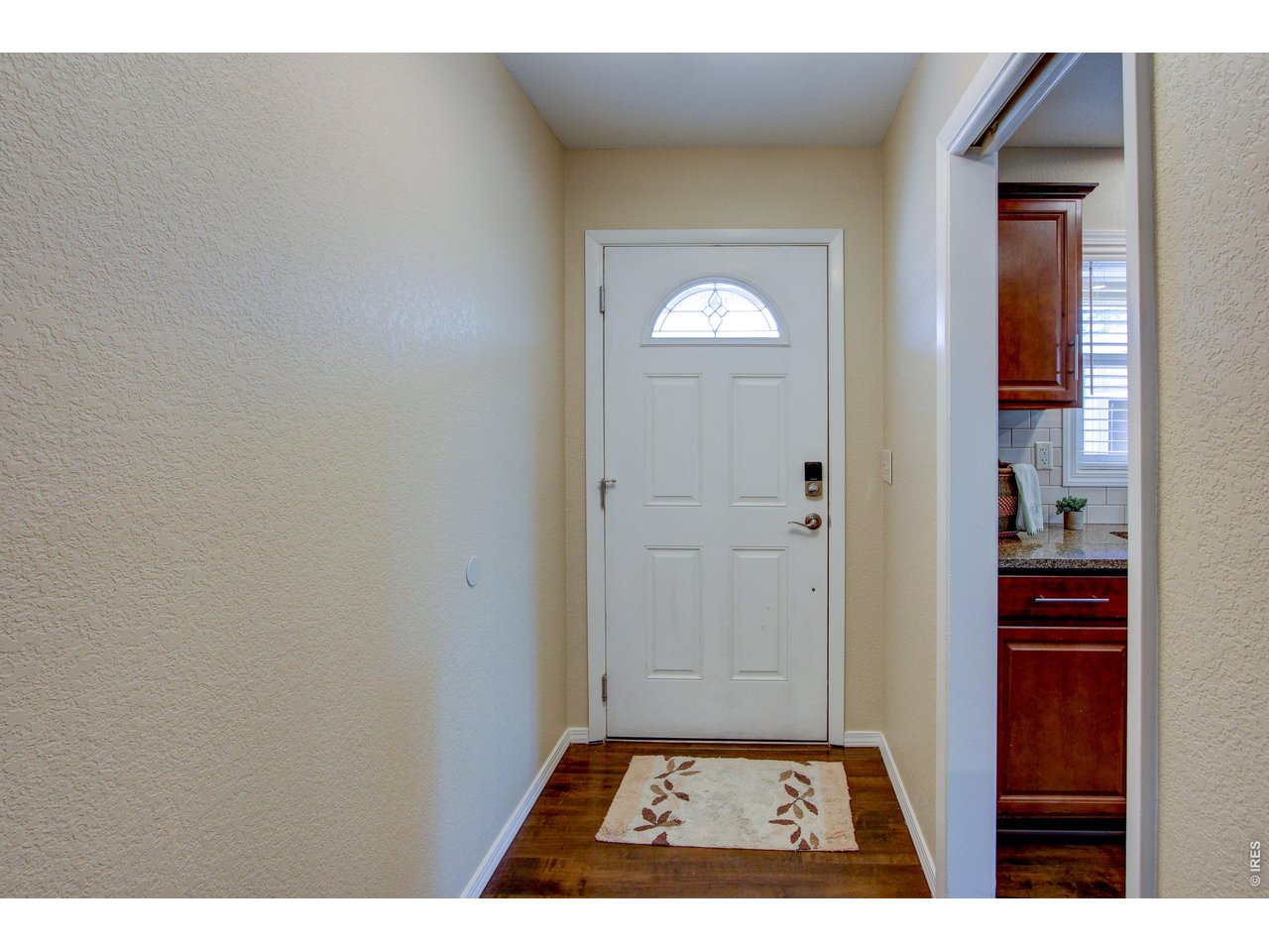 Experience the perfect blend of modern efficiency and country charm in this meticulously updated 3-bedroom, 2-bathroom ranch. Situated on a quiet dead-end street with no HOA, this home sits on nearly a half-acre backing to serene open space. Peace of mind comes standard with a long list of high-end improvements, including a new roof (2023) with durable Class 4 shingles, newer siding and soffits, and upgraded Pella windows in the living space(2016). The interior shines with new carpet (2025), a spacious kitchen featuring newer appliances, and a freshly updated primary bedroom shower. For year-round comfort, the home boasts energy-efficient radiant boiler heat with a history of annual checkups, a new mini-split system, and a fireplace insert offering three heat options. Efficiency is further enhanced by R-60 insulation in both the ceiling and garage. Outdoor enthusiasts will love the screened-in porch, fenced-in yard, and the historical well specifically for irrigation. The standout feature is the massive 5-car garage with a new opener, providing an incredible workspace for car buffs, woodworkers, or a home-based business. This is a rare opportunity to enjoy a private, rural feel with city conveniences just minutes away.