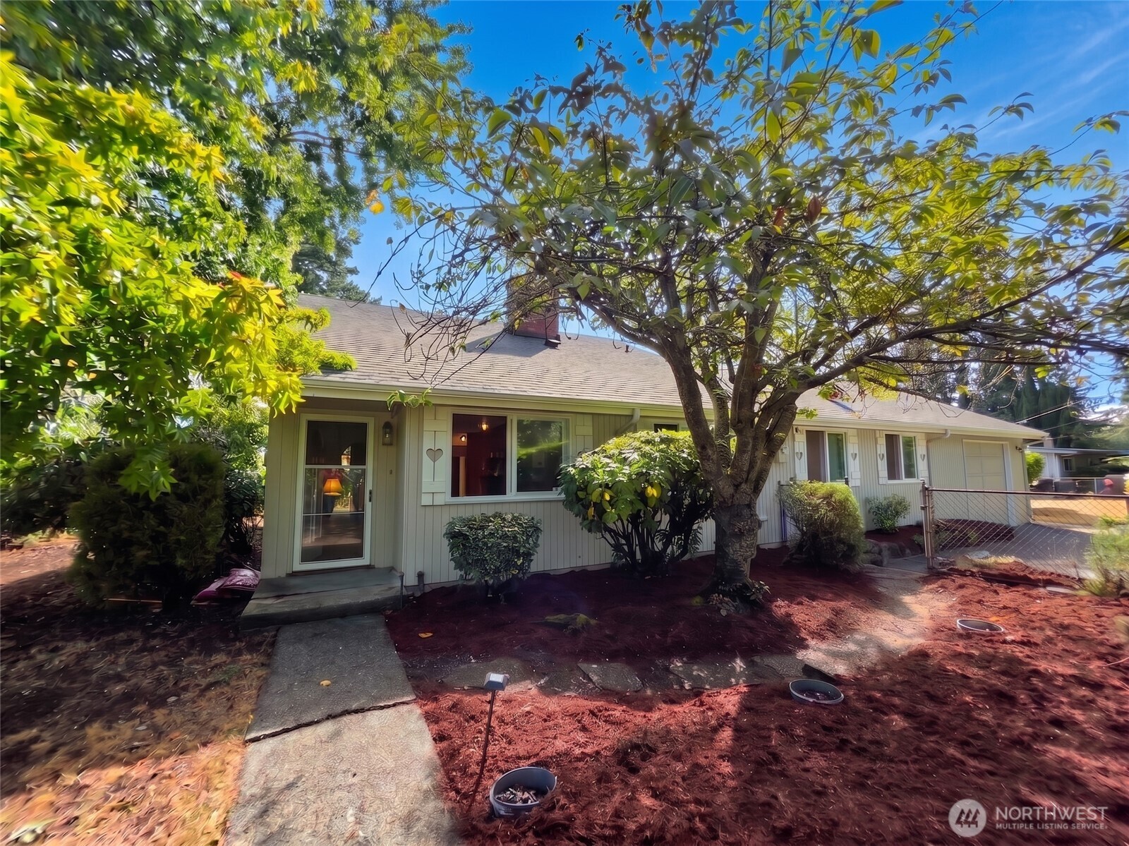 Rare opportunity near Normandy Park at an approachable price point. This updated classic 3 bed 2.5 bath is excellent for First Time Buyers looking to get some equity and/or Investors with a vision. The home sits on a spacious 8,806 SF corner lot with RV parking, a garage, and garden space, offering plenty of room to spread out both inside. The home comes with deeded Lot A rights to The Cove — Normandy Park's private 18-acre, 700-ft Puget Sound beachfront community with a boat launch and many amenities.      The main level offers 2 bedrooms and 1.5 baths, plus a cozy wood-burning fireplace and an open living / dining room. The kitchen has been updated and modernized, opening into a generously sized additional family room that's ideal for entertaining or everyday living. Major systems upgrades bring real peace of mind: Brand new panel with GFCI circuits and whole-home surge protection ready for mini-splits for AC. BONUS exterior EV charger.     A finished attic retreat upstairs delivers a private primary suite with a full bath and bonus space — ideal for a home office or nursery. Windows throughout have also been updated, and a fenced yard and patio area rounds out the outdoor living space. Zoned for North Hill-Primary, rated 8/10.       Solid bones, an unbeatable location, and modernized systems make this one worth seeing in person.  Large lot lends to future possibilities (ADU, DADU, etc. Buyer to Verify)