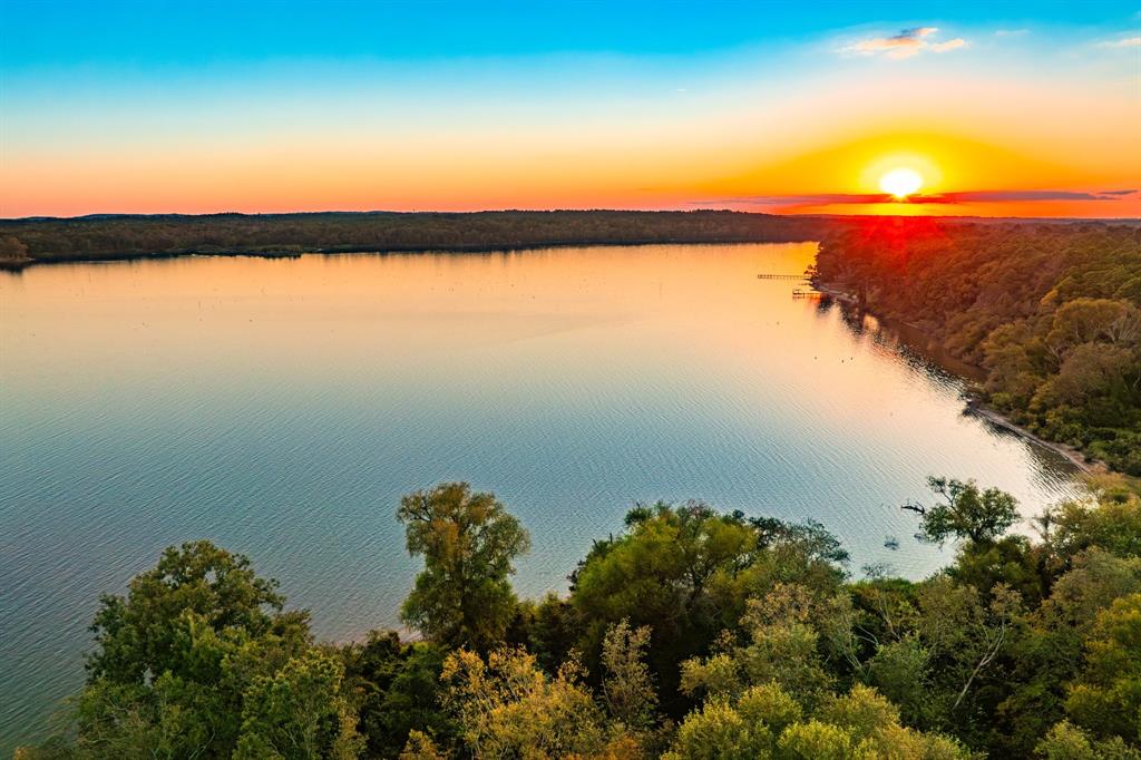 Lake Palestine Ranch is a rare offering, being the largest contiguous property with frontage on Lake Palestine. Lake Palestine is a sprawling 25,560 acre lake that touches 4 Texas Counties, located between Tyler & Athens, just 1.5 hrs back to Downtown Dallas. This is a unique opportunity to own such a large waterfront property on Lake Palestine that offers versatile use as an investment property, recreational ranch, waterfront development, cattle or hunting ranch. The ranch also has 10 internal ponds and lakes ranging from under acre to 7+ or - acres, offering additional recreation, hunting, and fishing opportunities. The opportunities are endless with this 650+ or - acre property. The ranch is about 60% wooded, and 40% pasture, offering a great balance for hunting, cattle, and access around the ranch. Lake Palestine Ranch is loaded with Native wildlife like Whitetail Deer, Feral Pigs, Eastern Turkey, Ducks, Dove, Coyotes, and other various species Native to this Region of Texas. In addition to hunting, Lake Palestine is known for great fishing, like Largemouth Bass, White Bass, Striped Bass, Crappie, Black-Nose Crappie, Sunfish, and various species of Catfish like Flathead, Channel, and Blue. The property has great access with 2,600 ft on CR 3412 & also 1,750 ft on CR 3411. The property has access to electricity, and an Aqua water line that runs along the County Road, in addition to the two water wells, 80 GPM & 20 GPM that serve the property. WATER: 2,000 ft of frontage on Lake Palestine. 10 private lakes and ponds on the property, ranging from under acre to 7+ or - acres. Two water wells, an 80 GPM well and a 20 GPM well. There is also an Aqua water line at the County Road. LOCATION: 1.5 hours to Downtown Dallas, 28 mins to Athens, 30 mins to Tyler, 2 hours to Waco, 3 hours to Houston, 3.5 hrs to Austin, 5 hrs to San Antonio. UTILITIES: Aqua water line, electricity, 2 water wells.